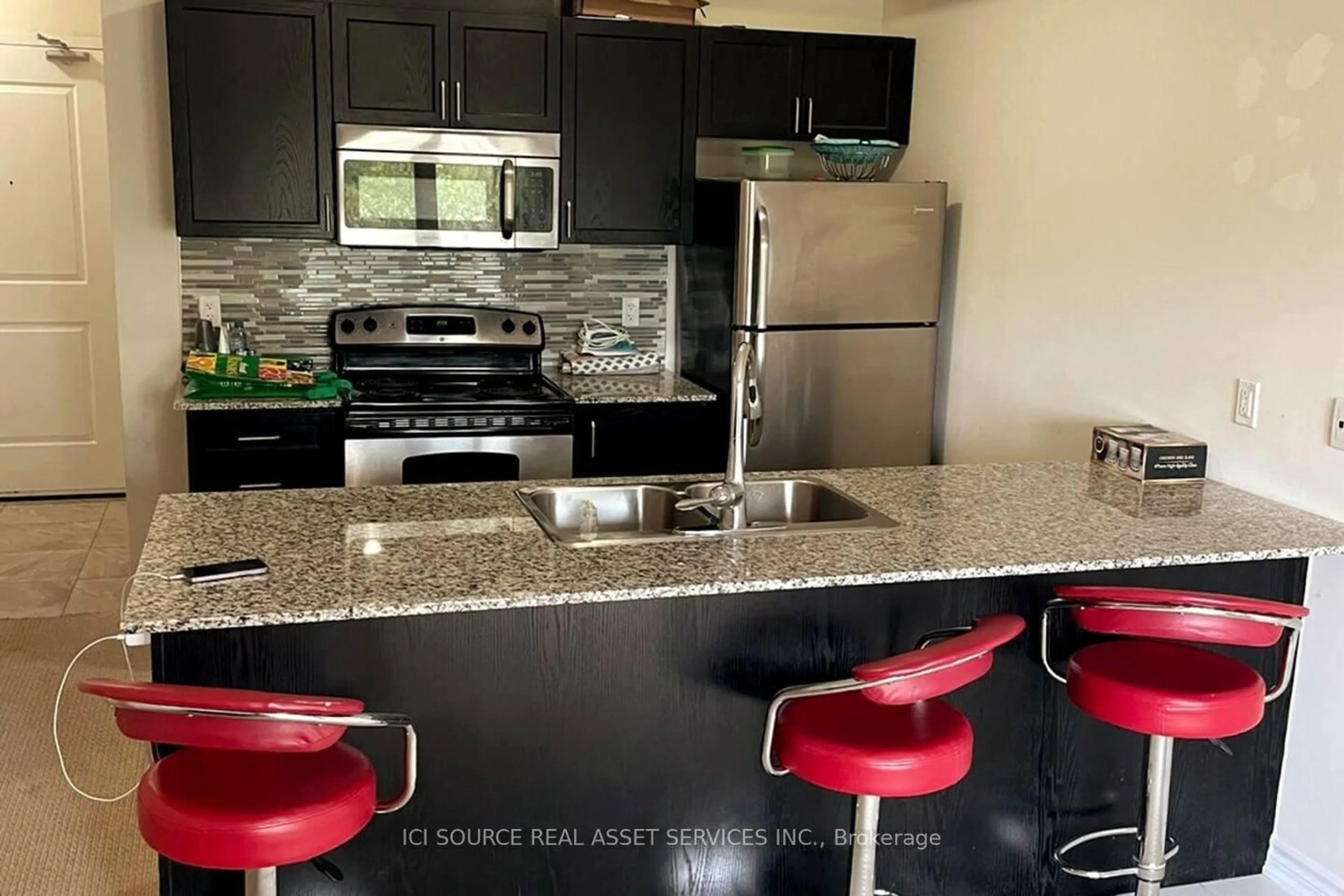 Open concept kitchen, unknown for 1360 Costigan Rd #101, Milton Ontario L9T 0Y8