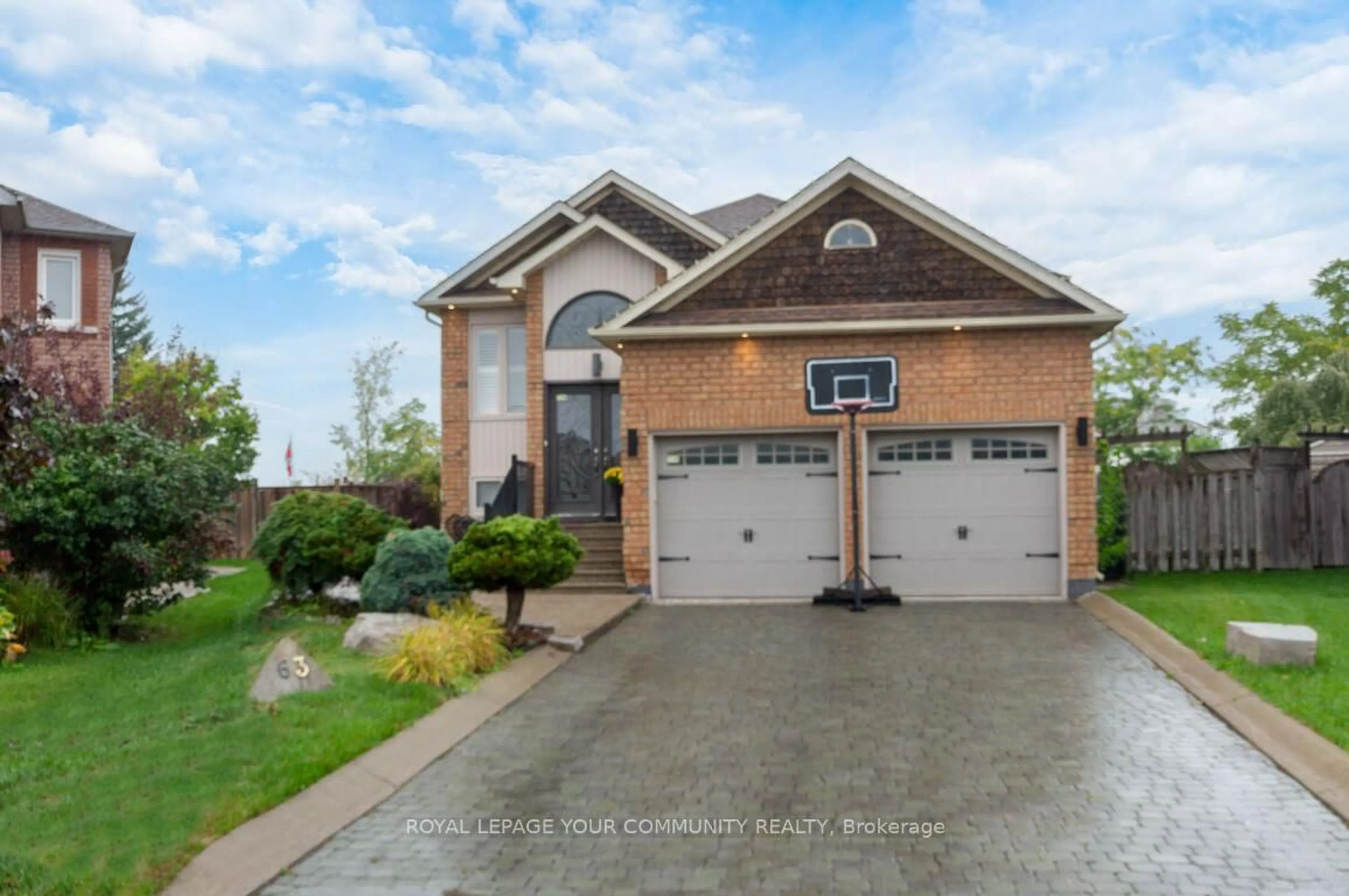 Home with brick exterior material, street for 63 Rolling Hills Lane, Caledon Ontario L7E 1T8
