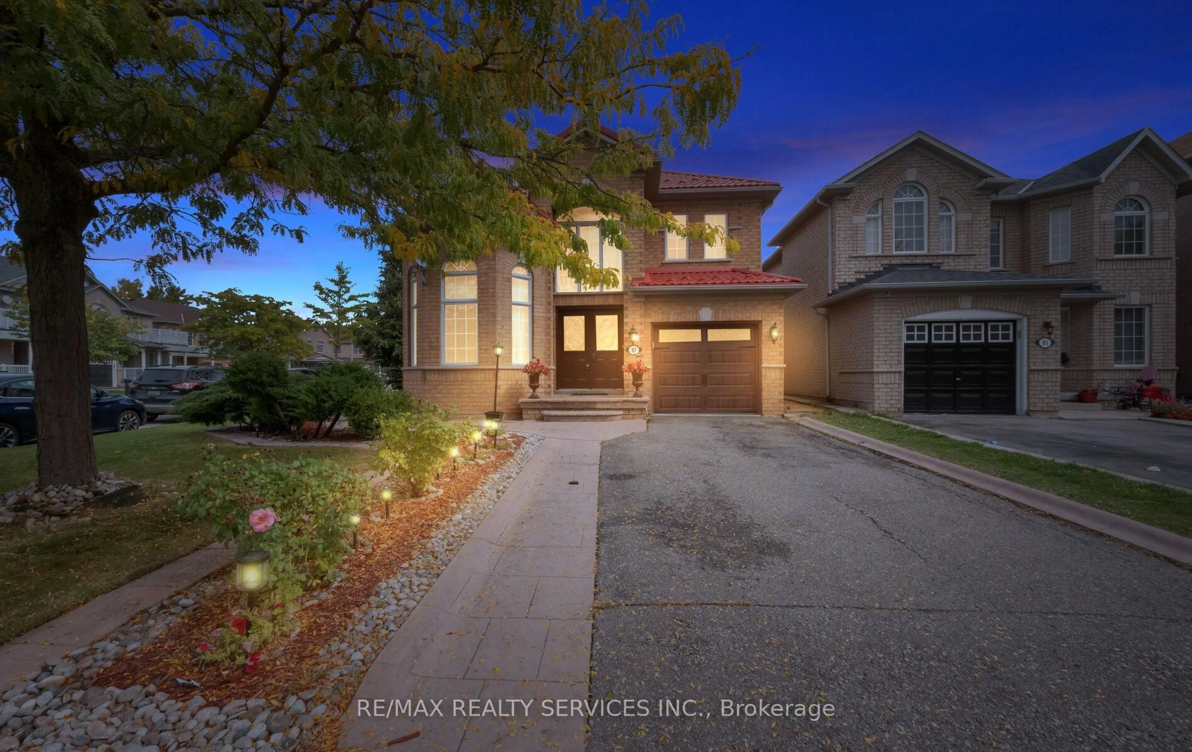 Home with brick exterior material, street for 87 Queen Mary Dr, Brampton Ontario L7A 2K2