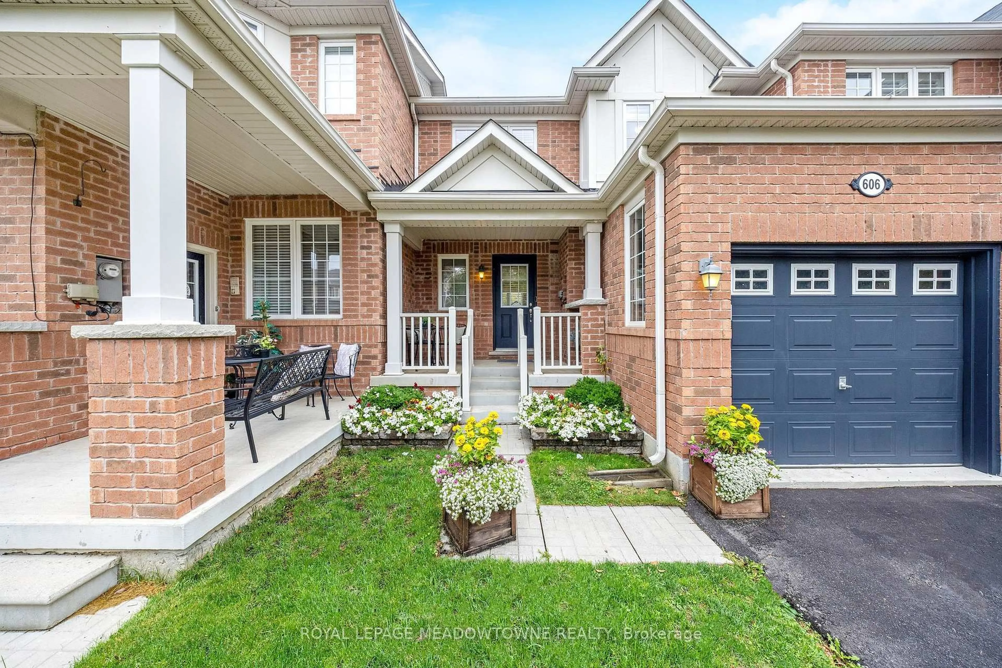 Home with brick exterior material, street for 606 Cargill Path, Milton Ontario L9T 7X2