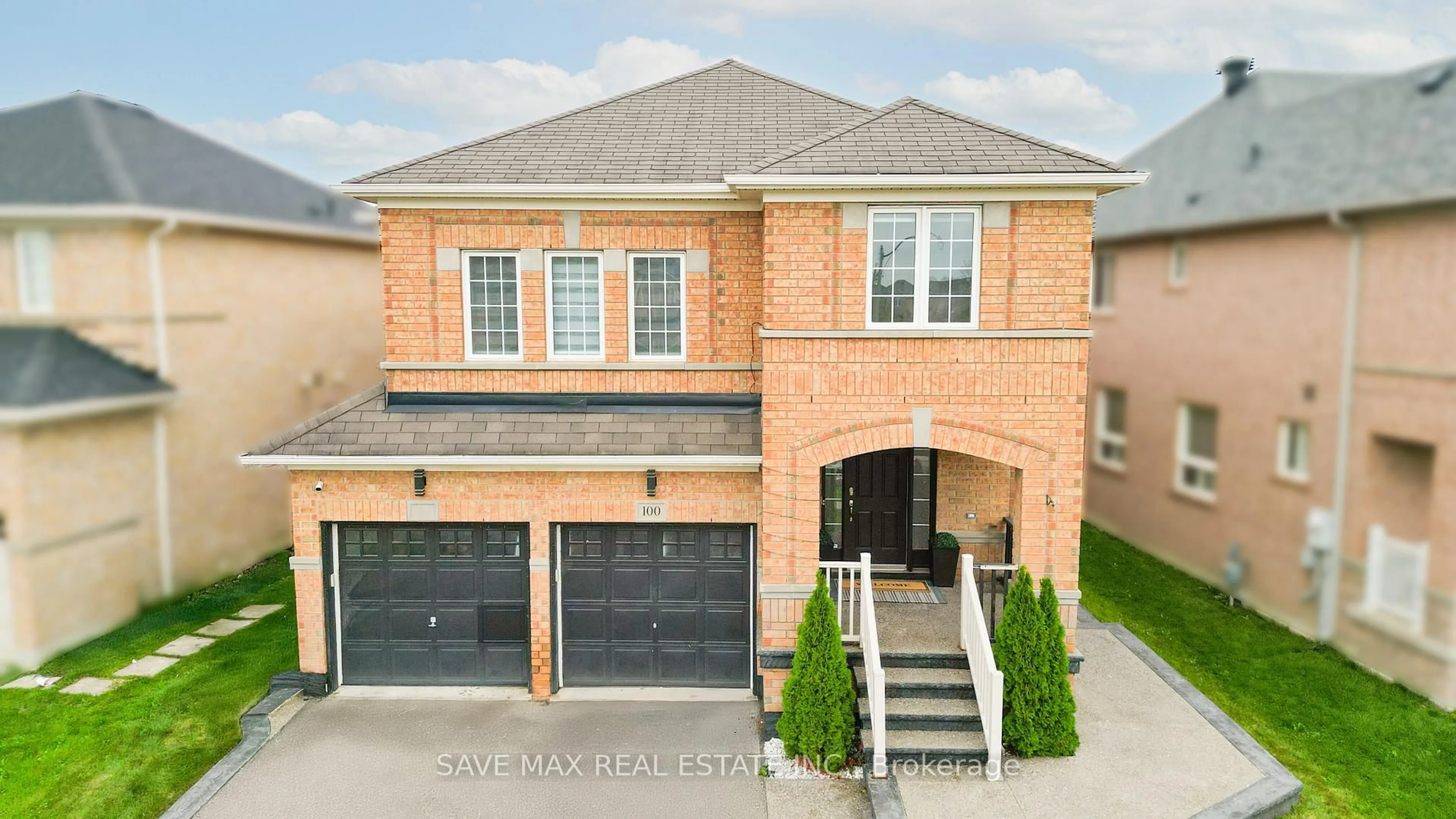 Home with brick exterior material, street for 100 Crown Victoria Dr, Brampton Ontario L7A 3X6