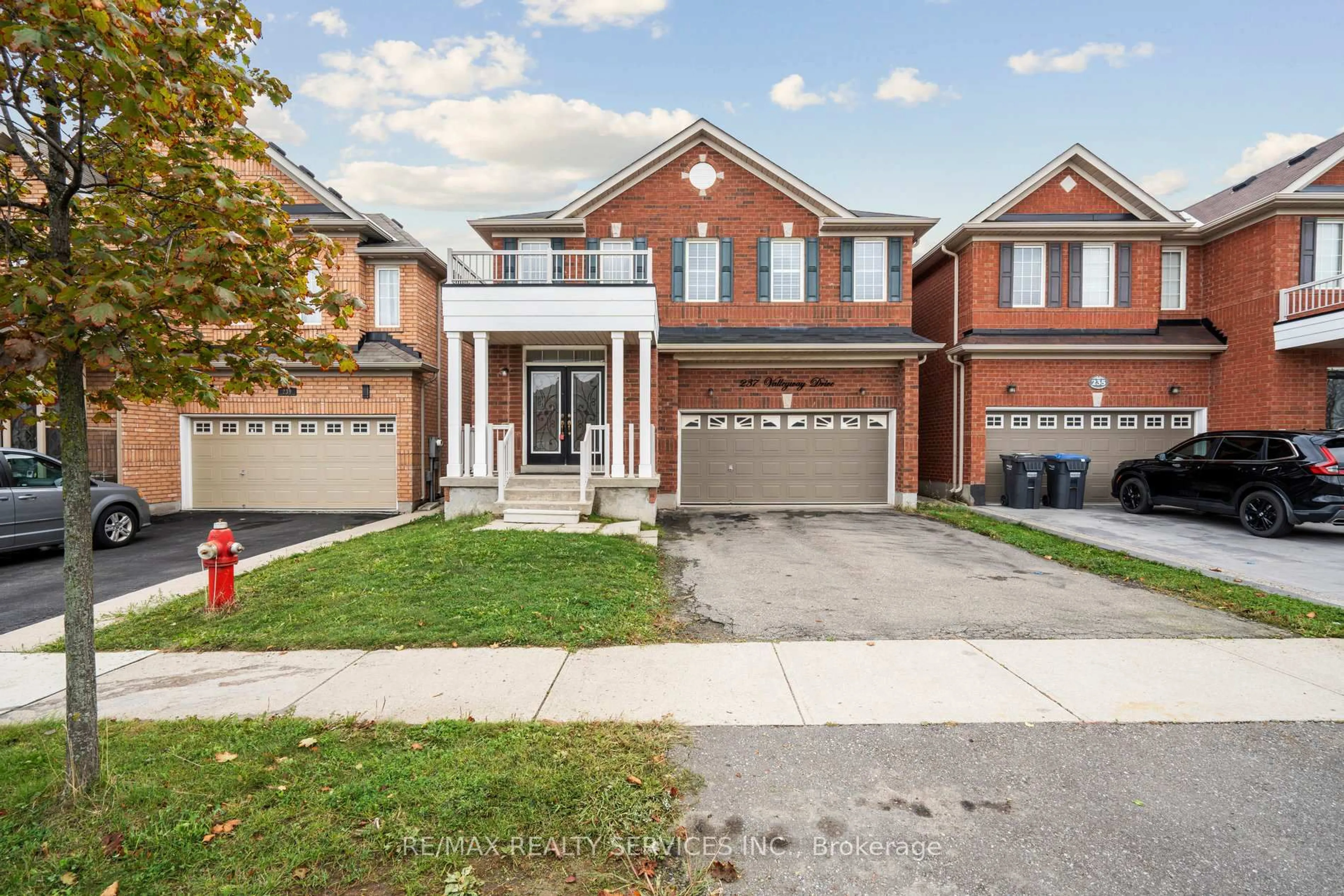 Home with brick exterior material, street for 237 Valleyway Dr, Brampton Ontario L6X 0N9