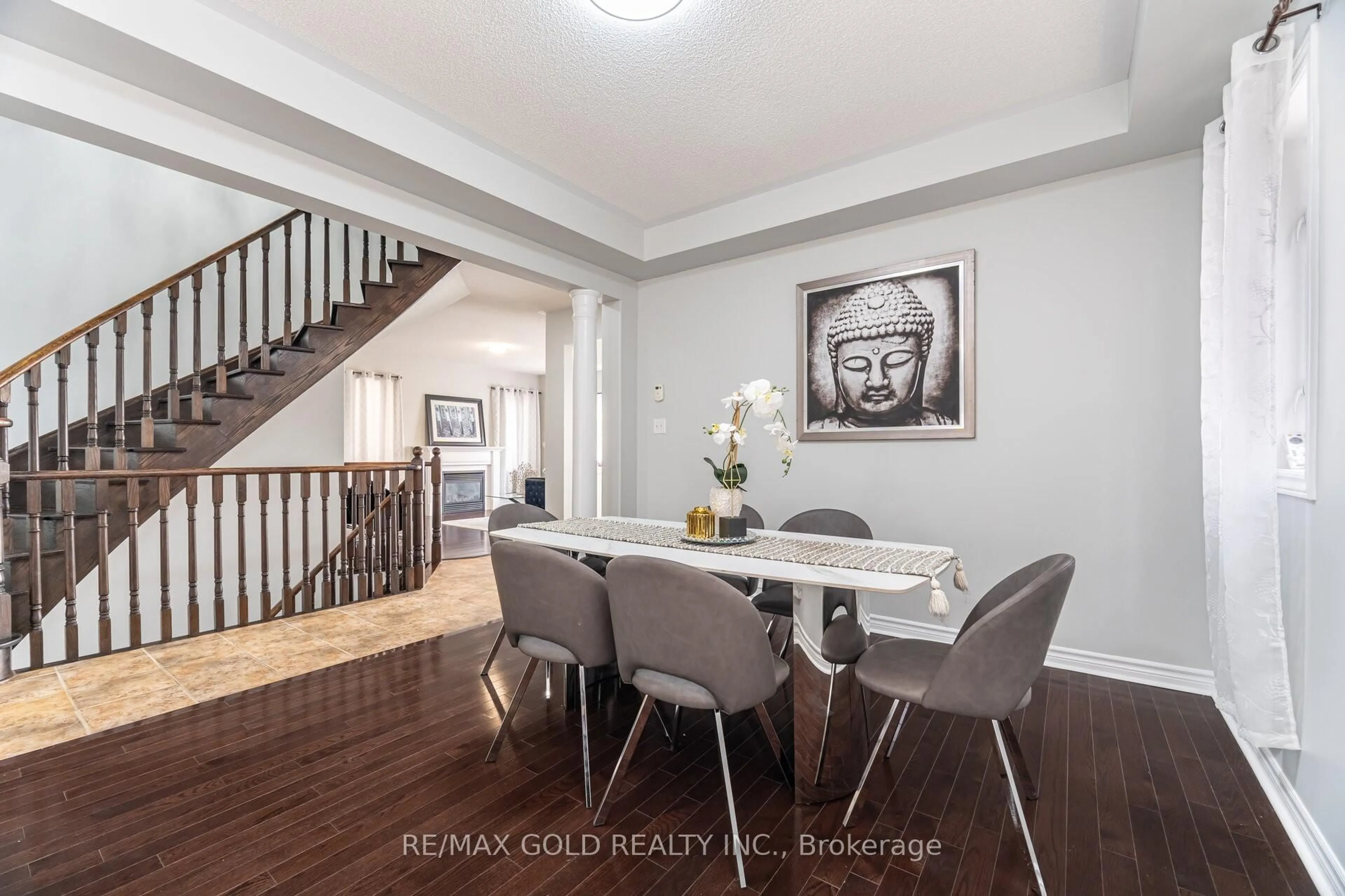 Dining room, wood/laminate floor for 15 Oakhaven Rd, Brampton Ontario L6P 2Y3