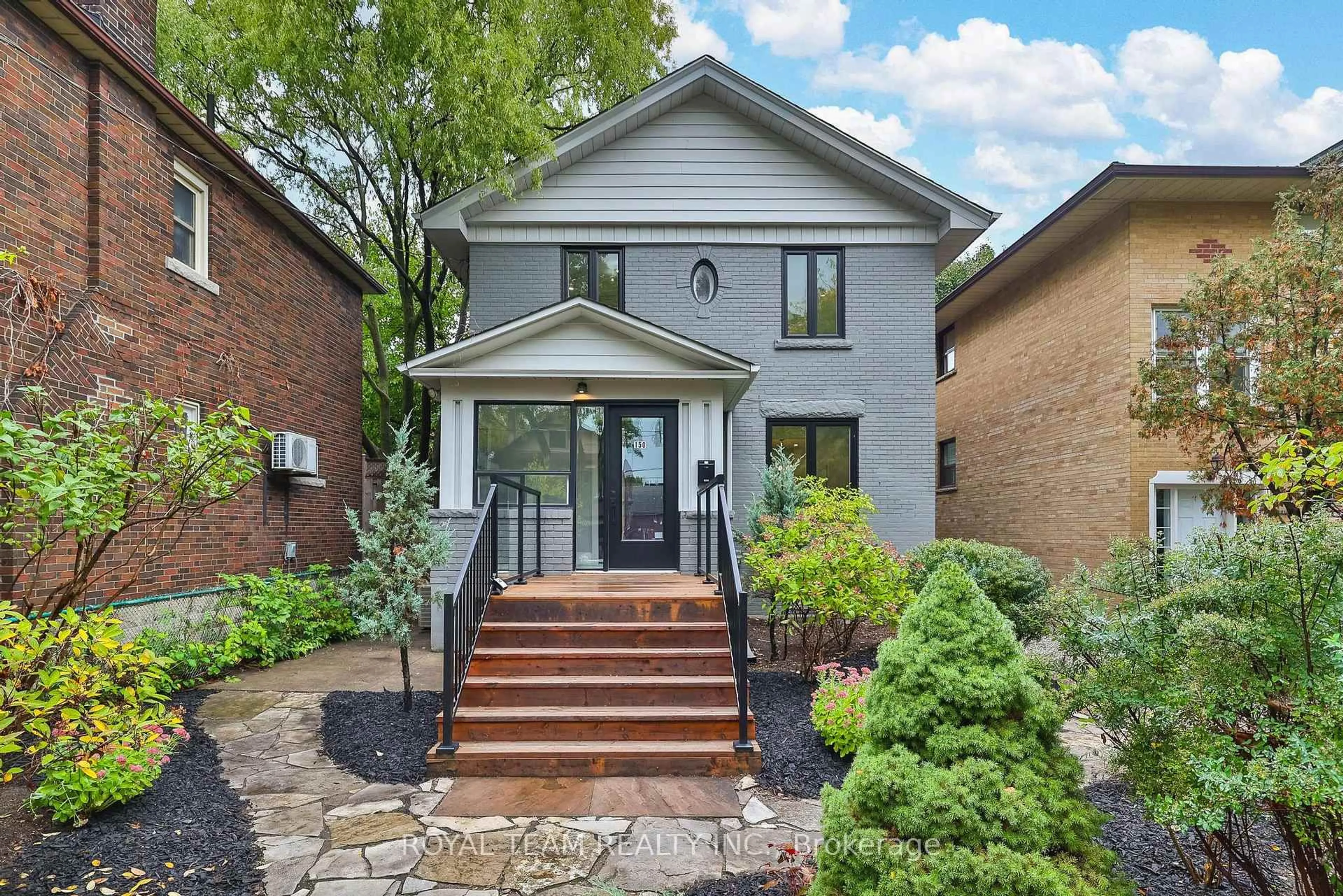 Home with brick exterior material, street for 150 St Johns Rd, Toronto Ontario M6P 1T9