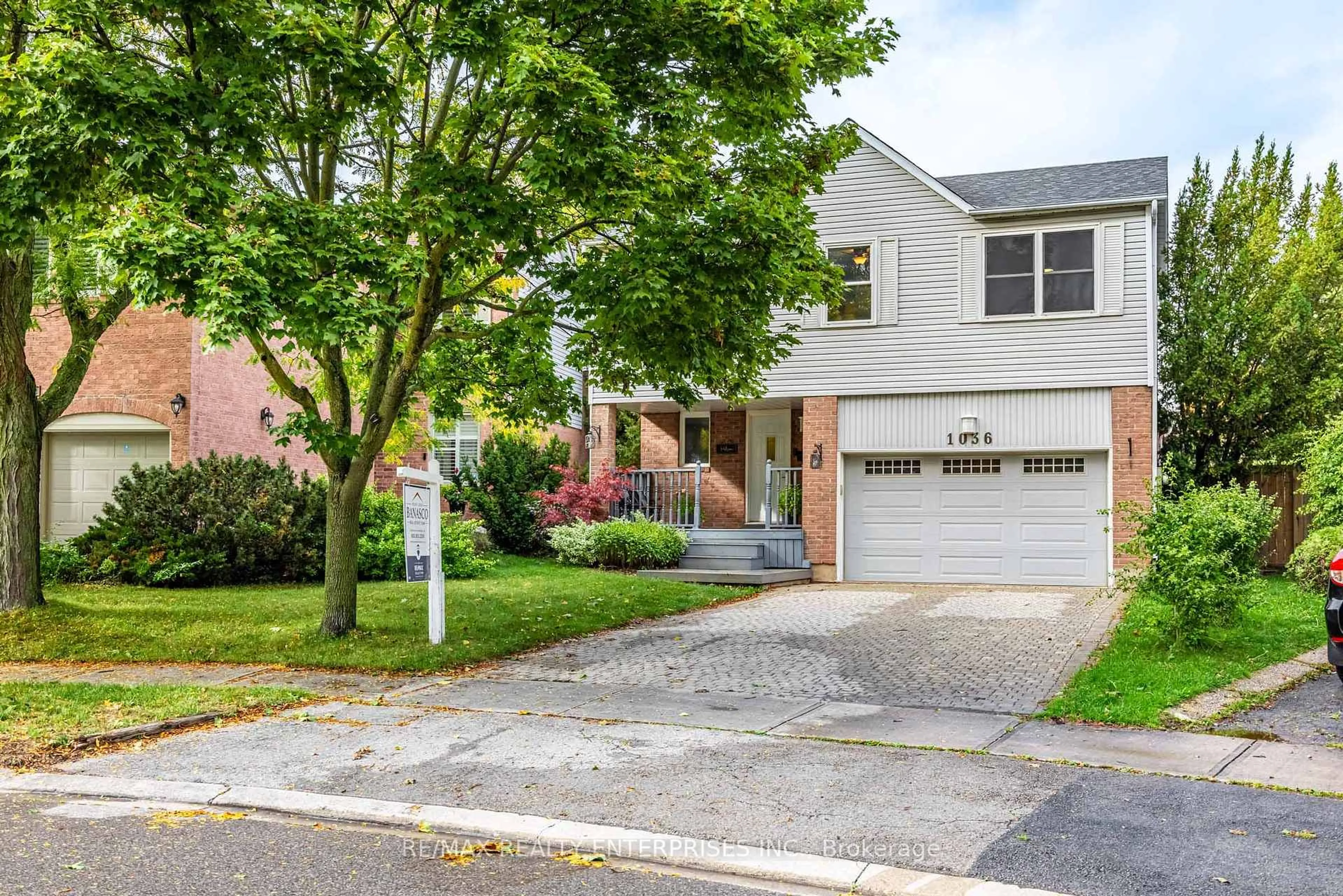 Home with brick exterior material, street for 1036 Bridlewood Tr, Oakville Ontario L6M 2K5