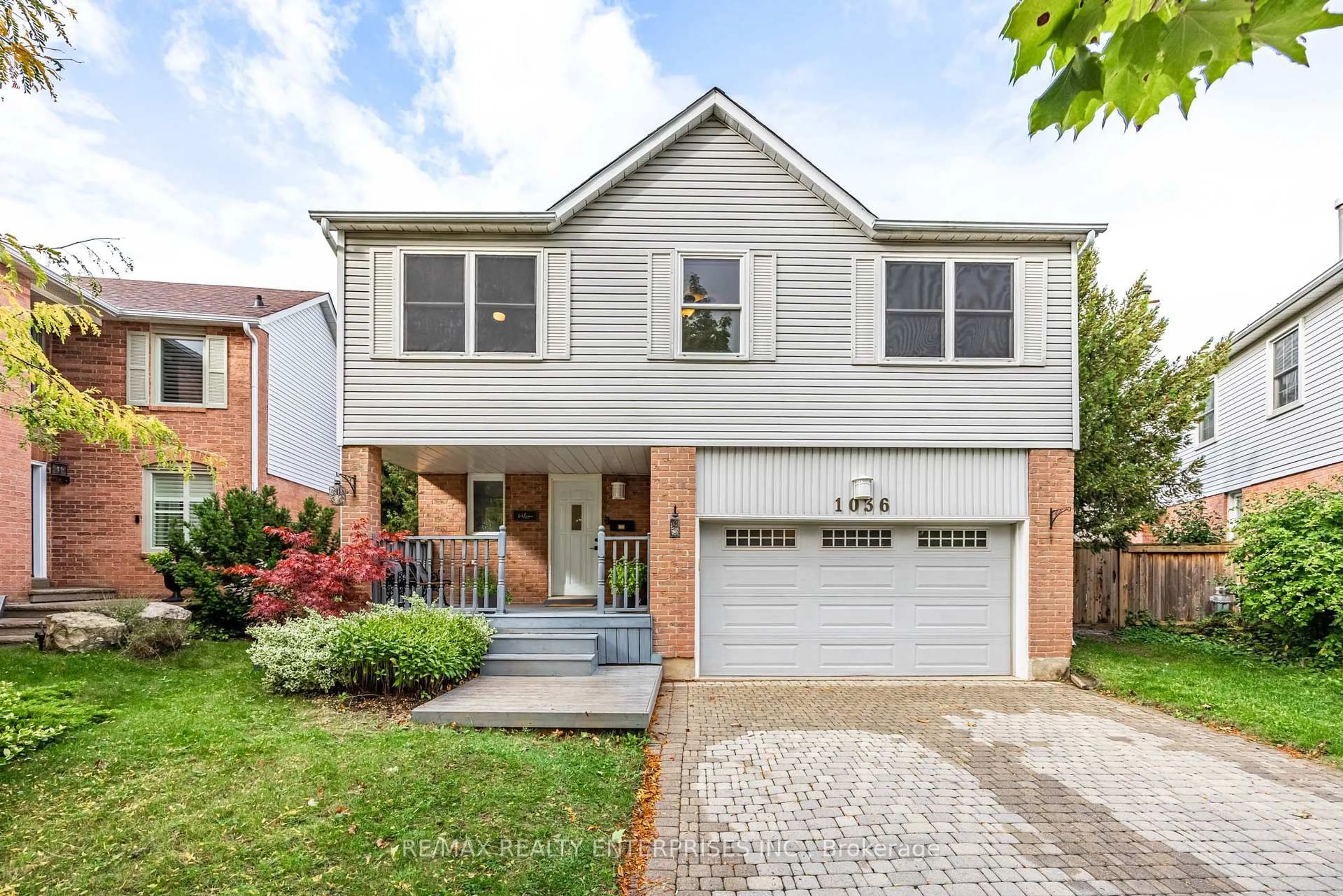Home with brick exterior material, street for 1036 Bridlewood Tr, Oakville Ontario L6M 2K5