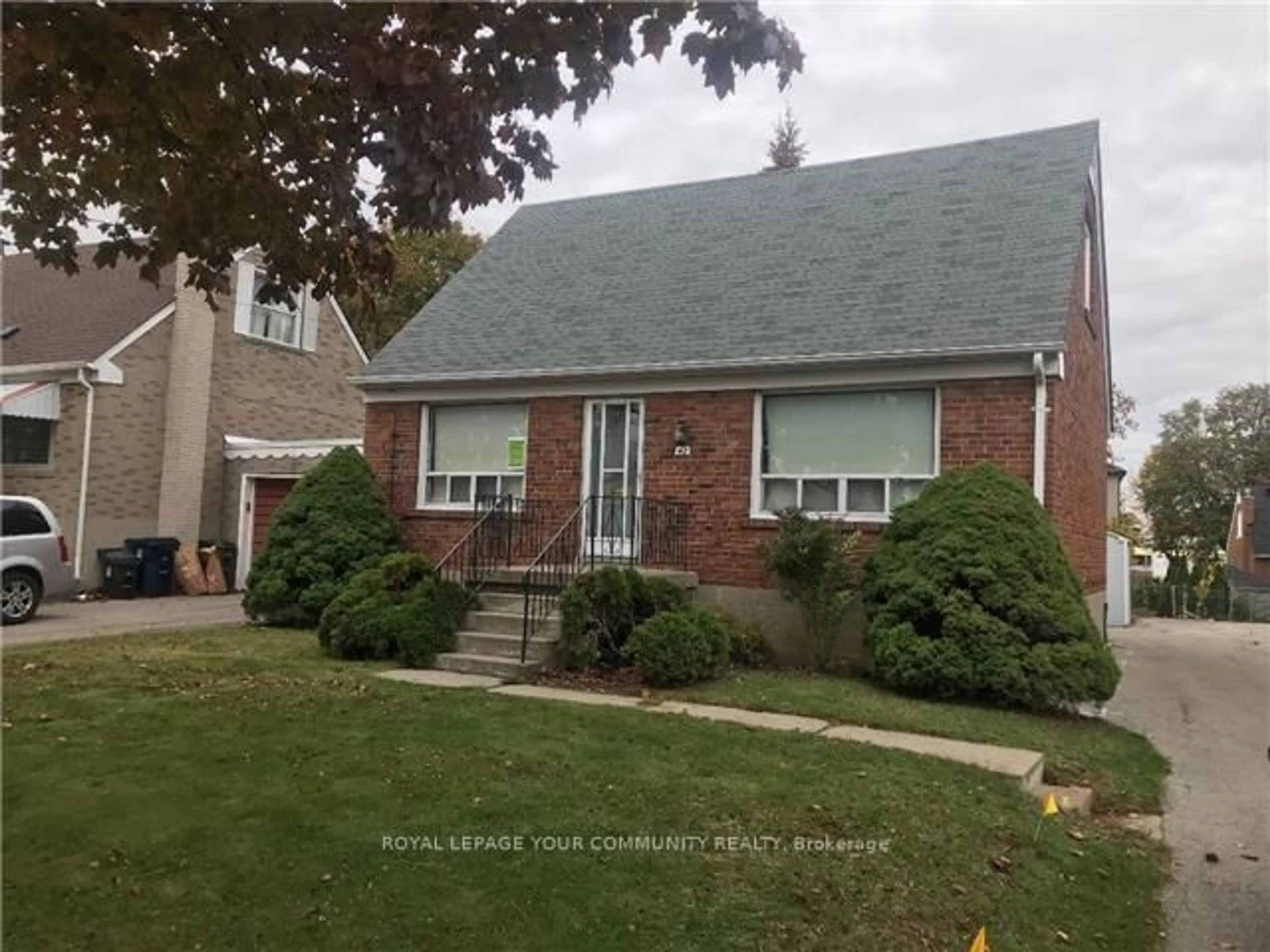 Home with vinyl exterior material, street for 42 Yorkdale Cres, Toronto Ontario M9M 1C1