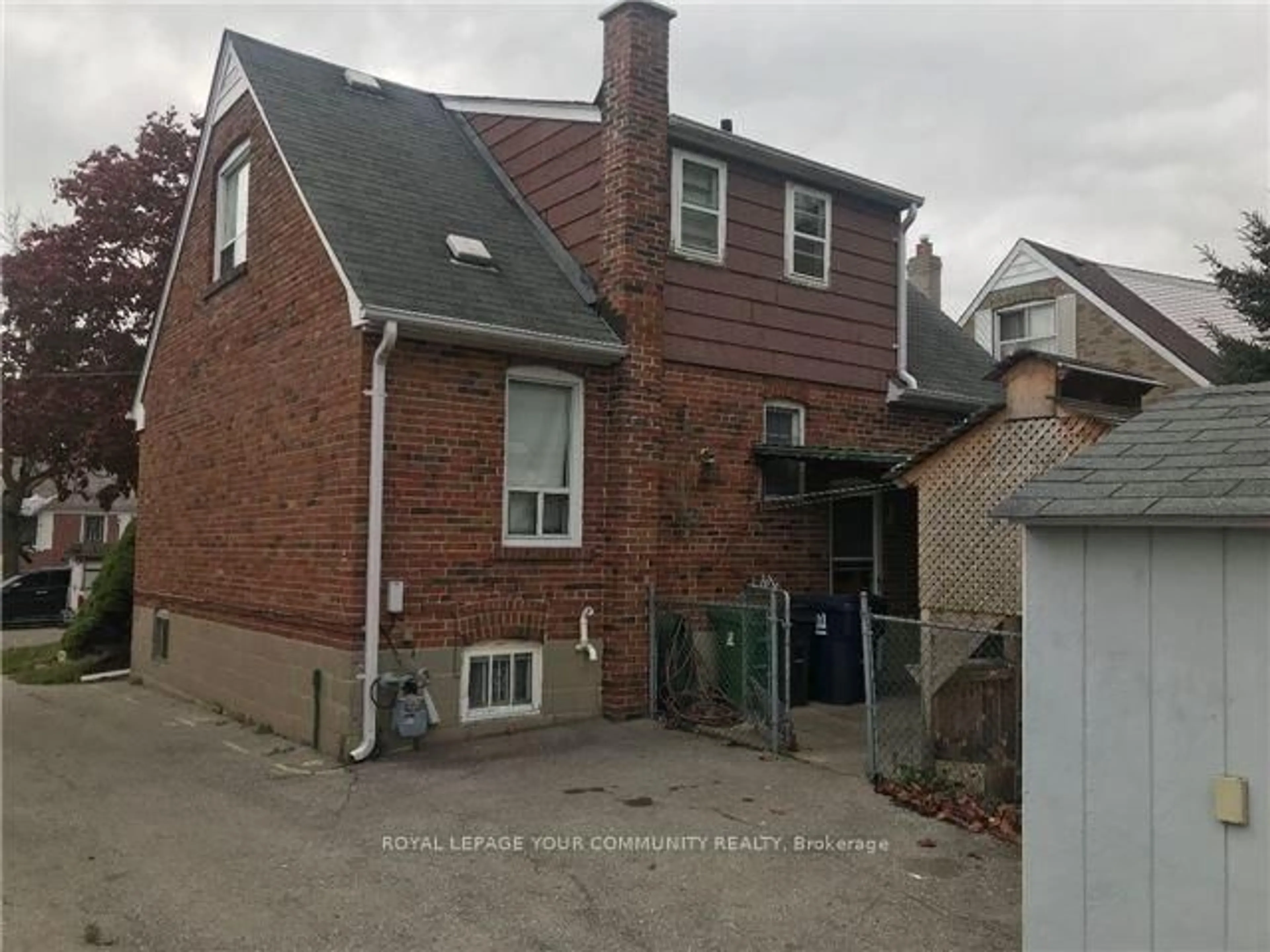 Home with brick exterior material, street for 42 Yorkdale Cres, Toronto Ontario M9M 1C1