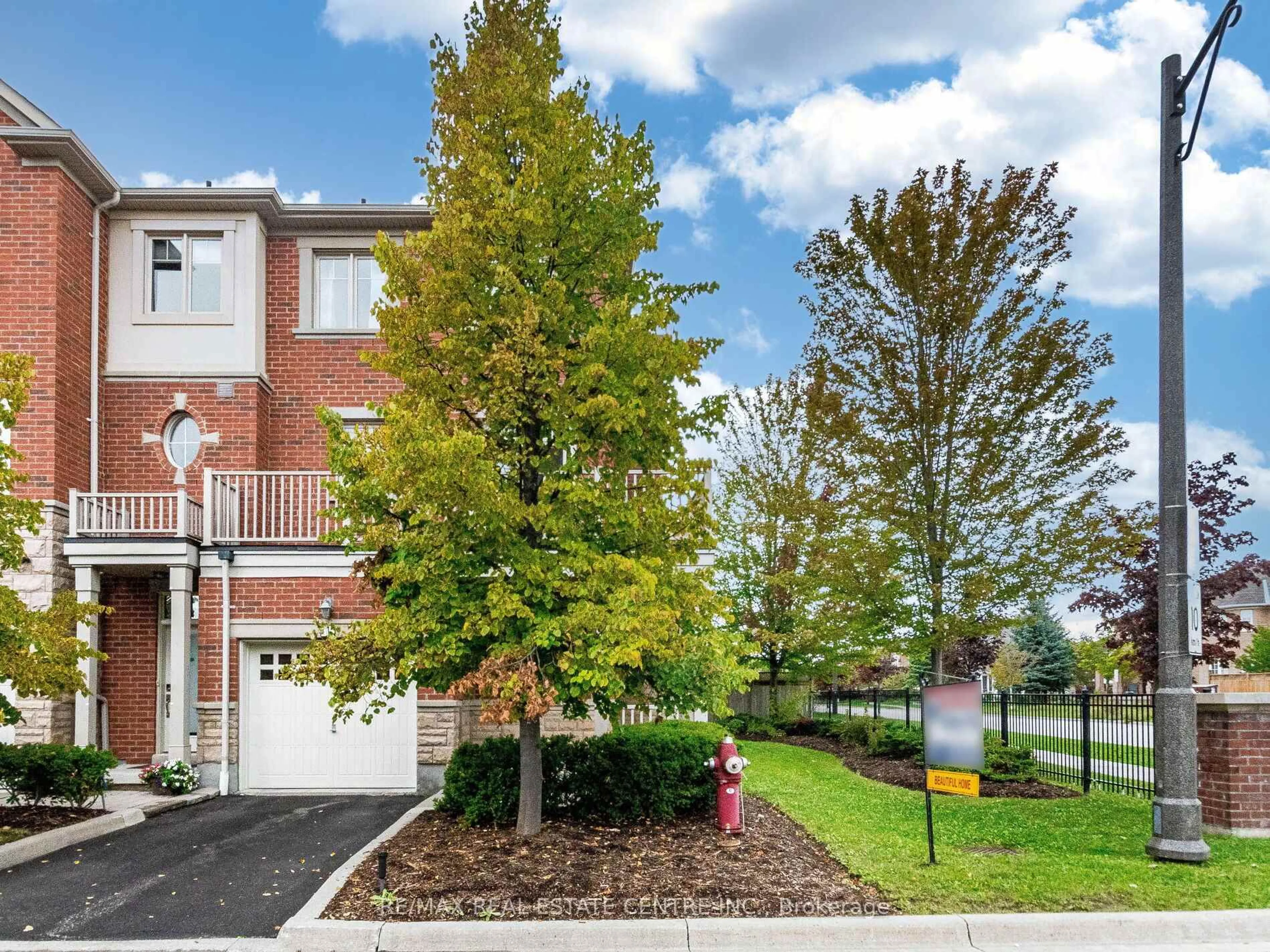 A pic from outside/outdoor area/front of a property/back of a property/a pic from drone, street for 5710 Long Valley Rd #1, Mississauga Ontario L5M 0M1