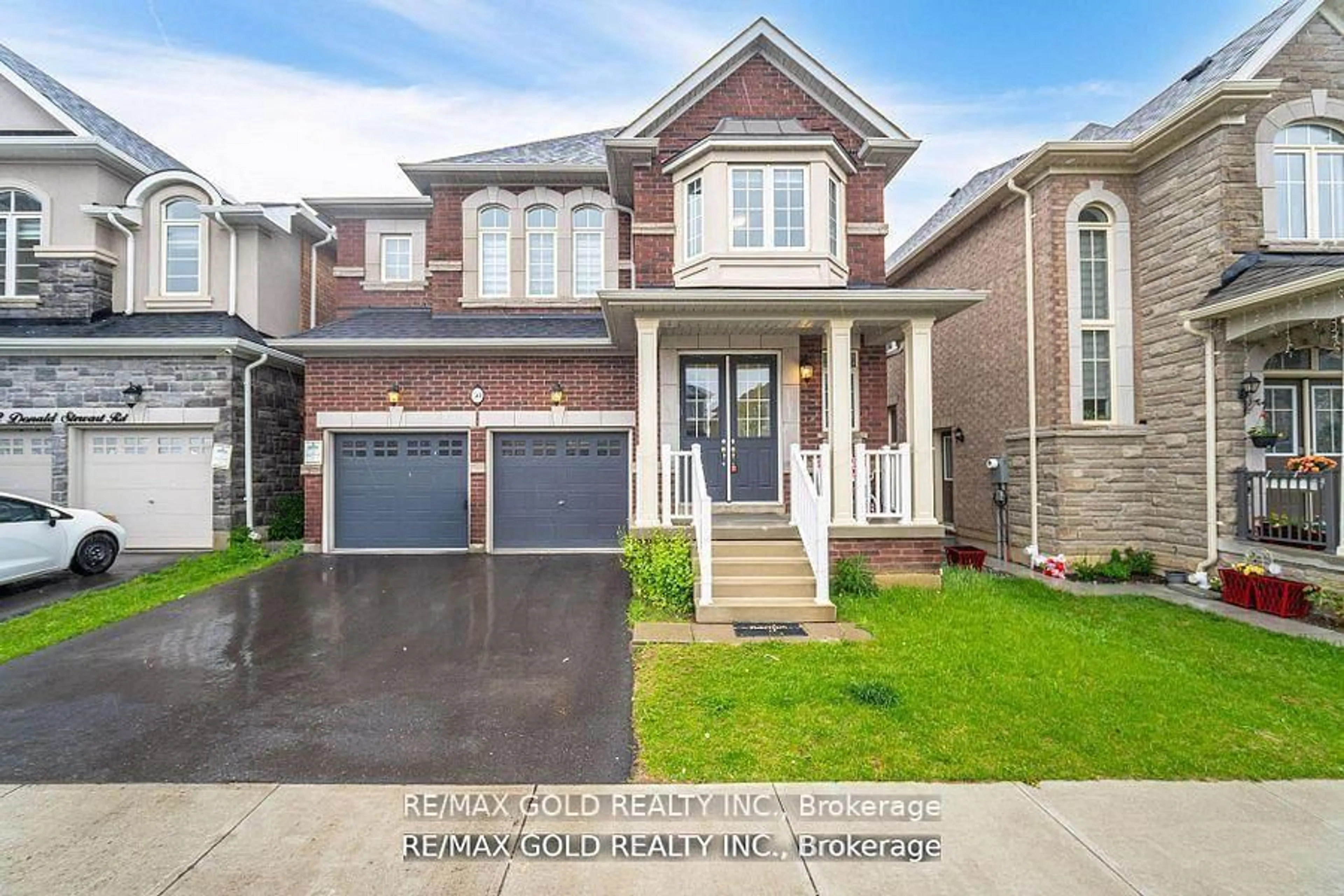 Home with brick exterior material, street for 50 Donald Stewart Rd, Brampton Ontario L7A 5J1