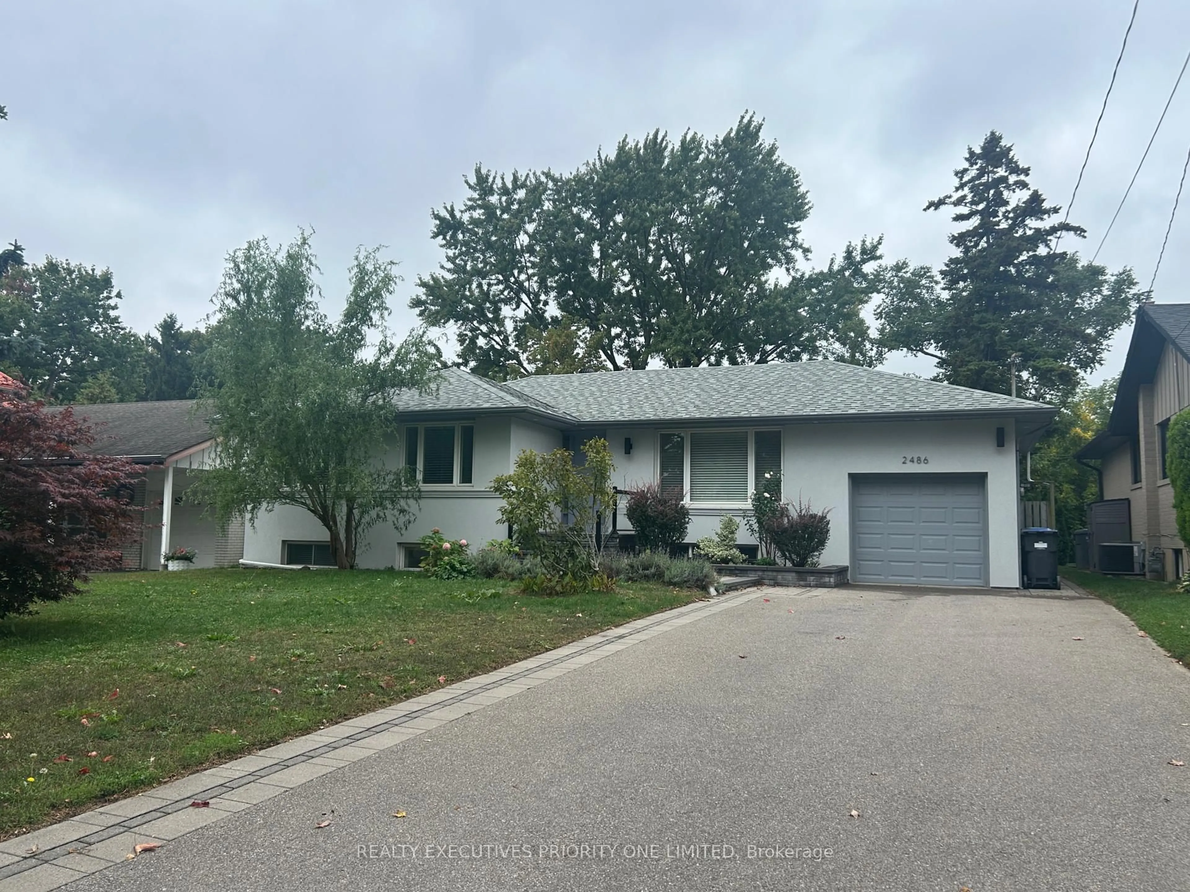 Home with vinyl exterior material, street for 2486 Edenhurst Dr, Mississauga Ontario L5A 2K9