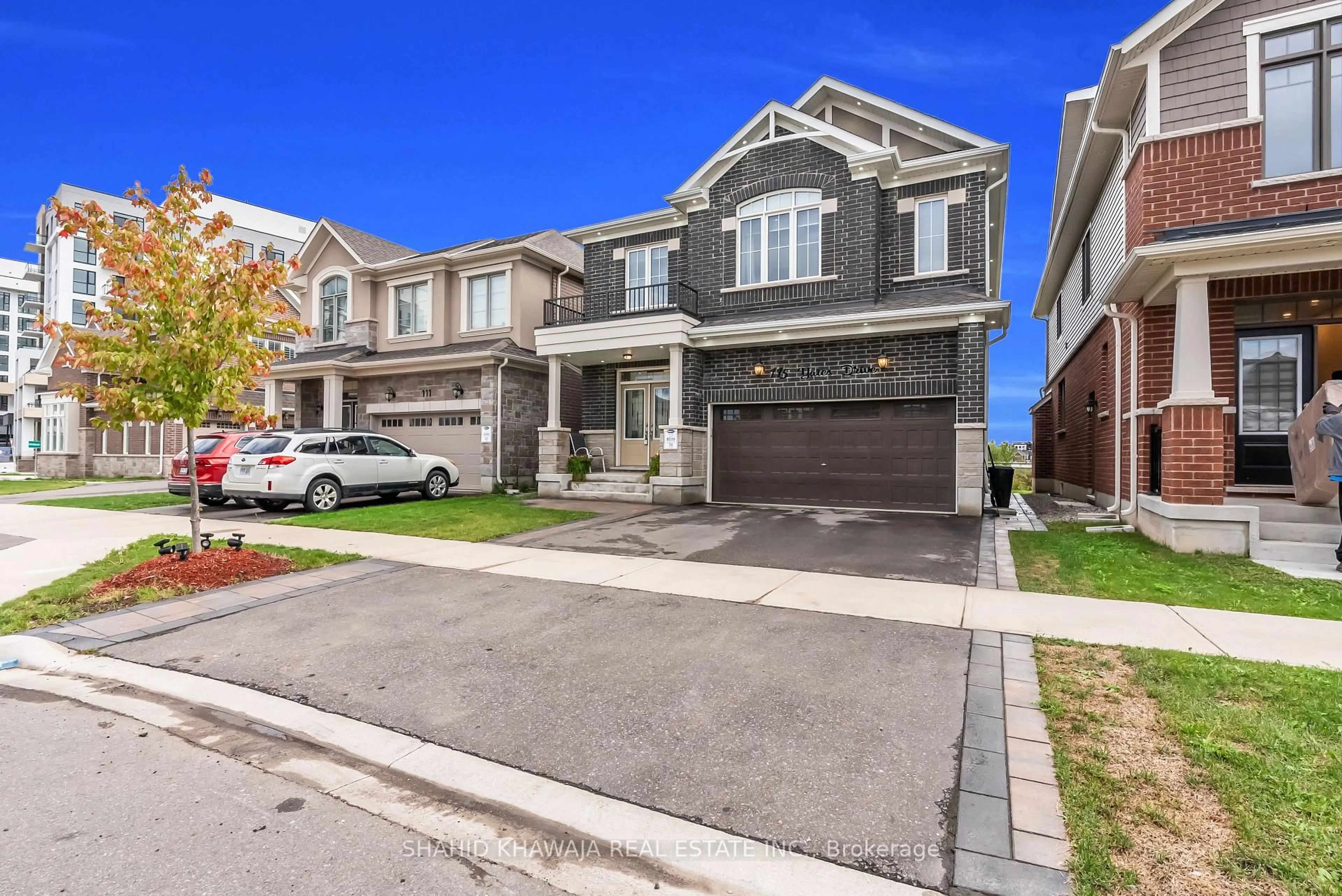 Home with brick exterior material, street for 115 Yates Dr, Milton Ontario L9T 2X5