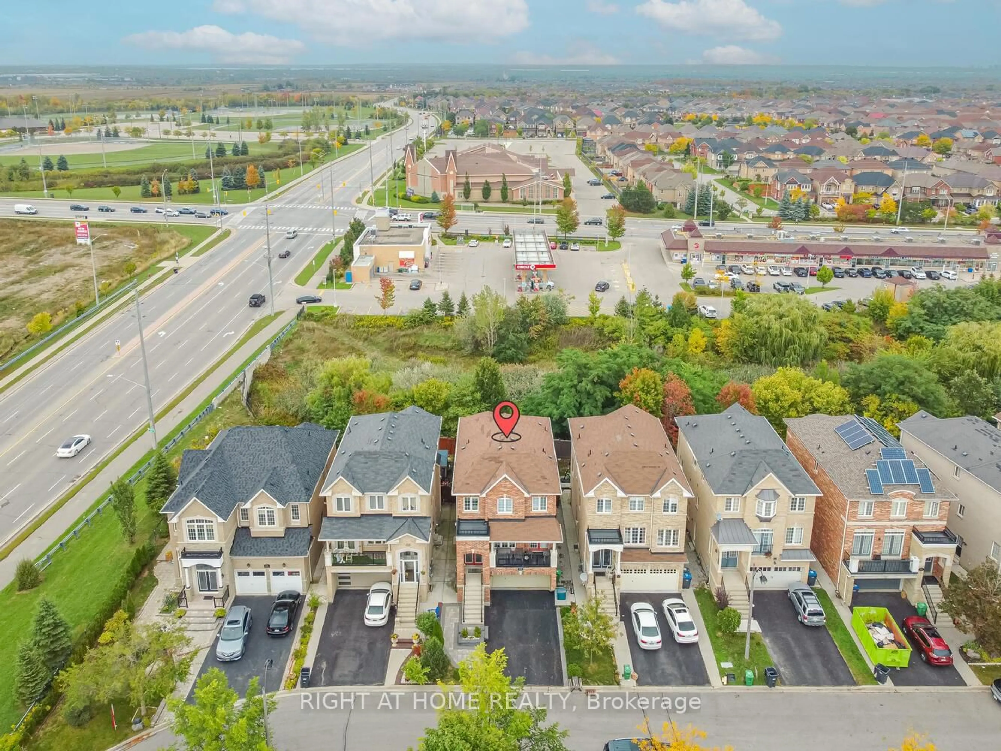 A pic from outside/outdoor area/front of a property/back of a property/a pic from drone, street for 64 EVERINGHAM Circ, Brampton Ontario L6R 0R7