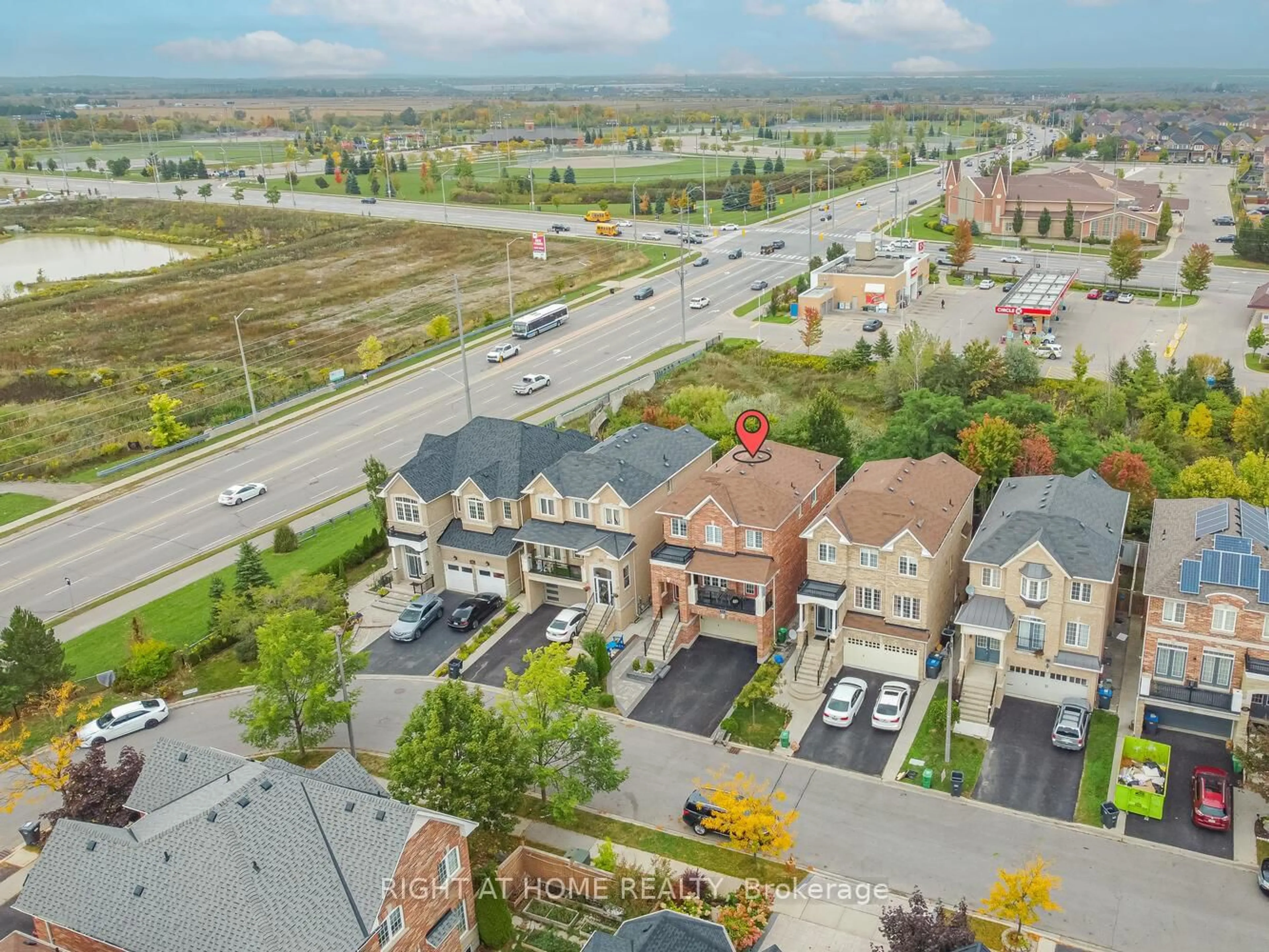 A pic from outside/outdoor area/front of a property/back of a property/a pic from drone, street for 64 EVERINGHAM Circ, Brampton Ontario L6R 0R7