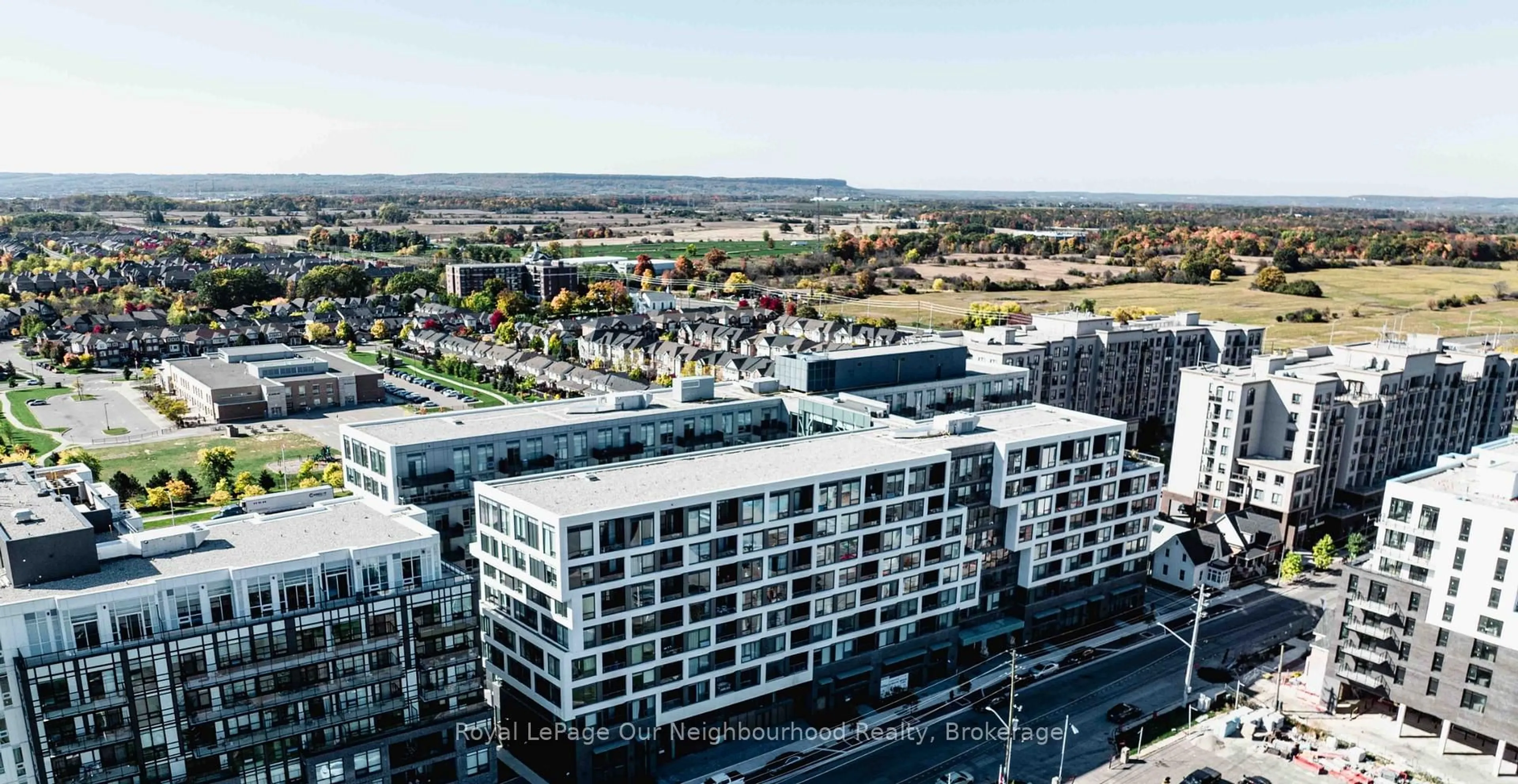 A pic from outside/outdoor area/front of a property/back of a property/a pic from drone, city buildings view from balcony for 2450 Old Bronte Rd #231, Oakville Ontario L5M 5P6