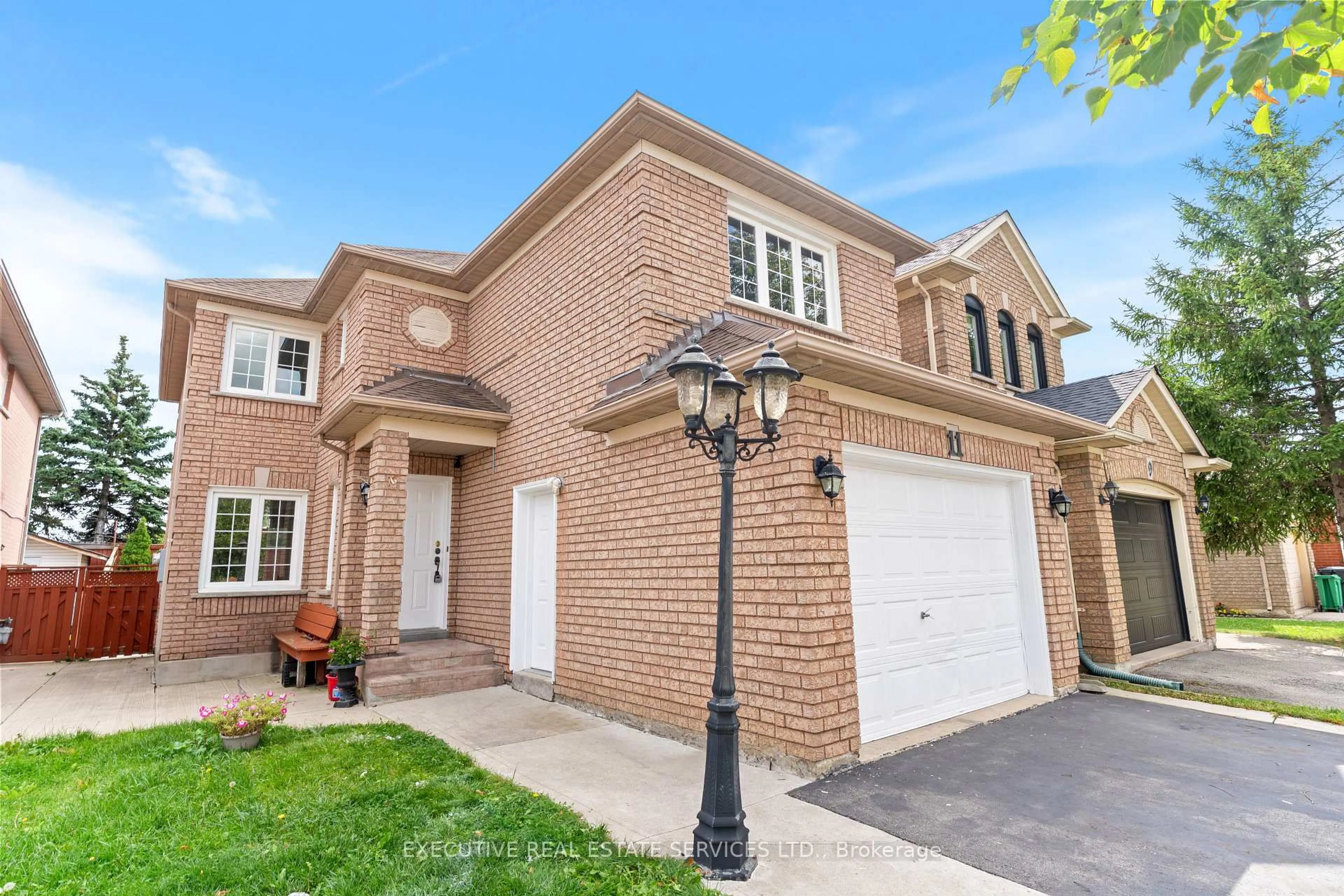 Home with brick exterior material, street for 11 Upwood Pl, Brampton Ontario L6R 1T3