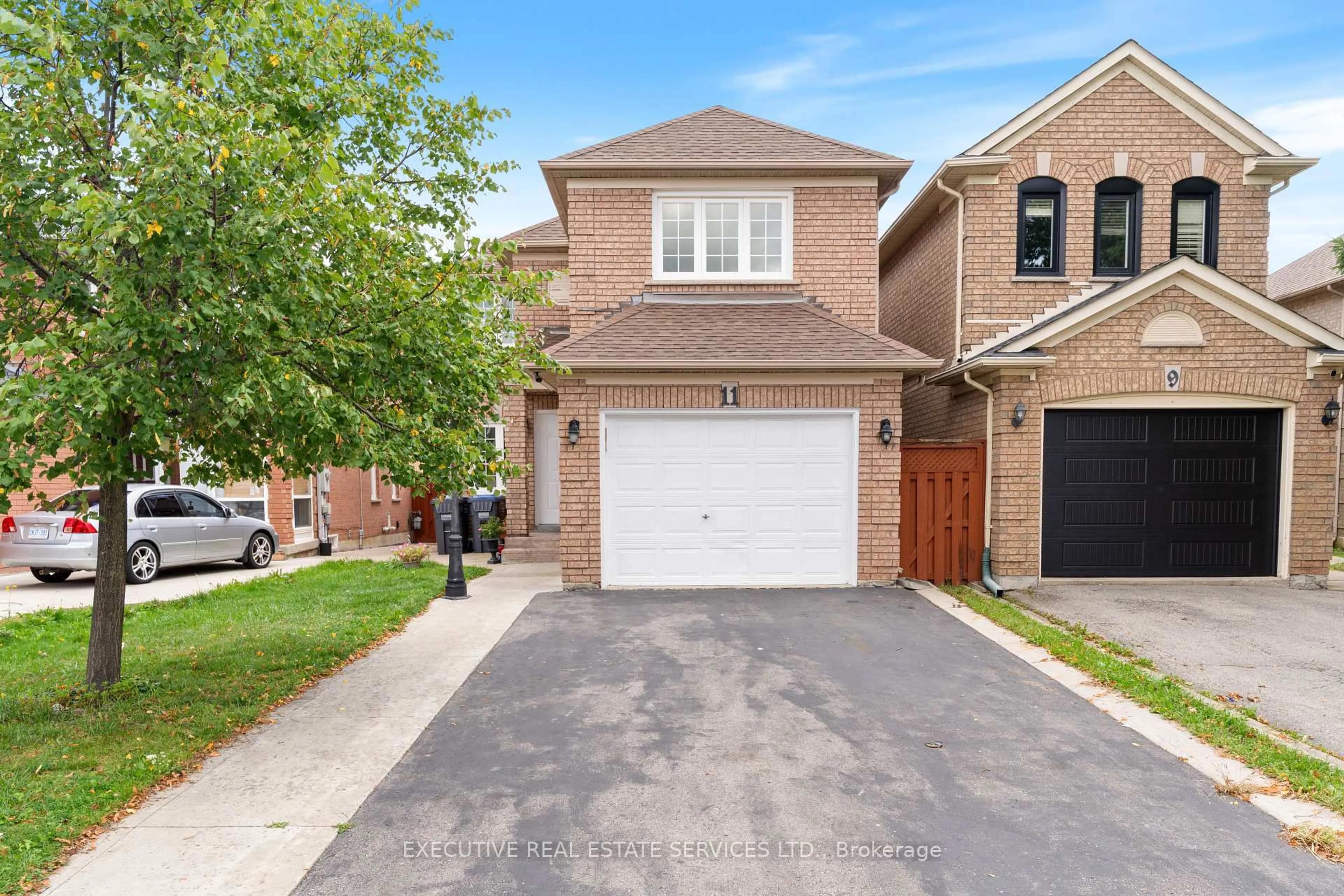Home with brick exterior material, street for 11 Upwood Pl, Brampton Ontario L6R 1T3