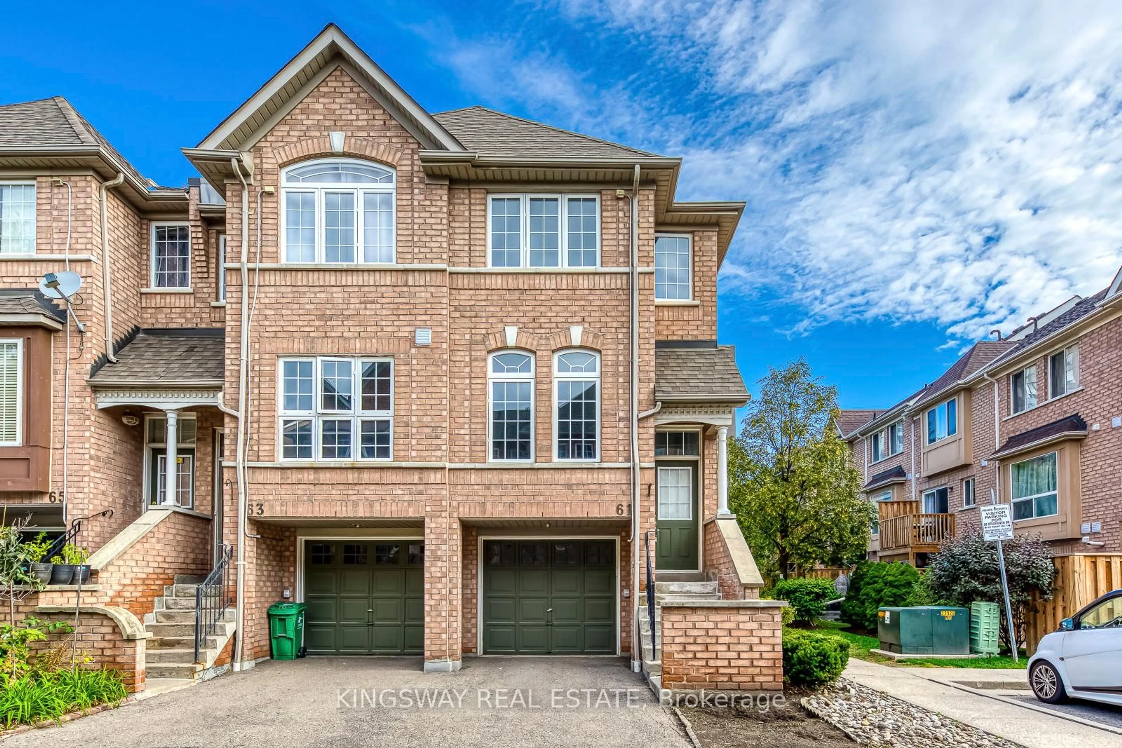 Home with brick exterior material, street for 50 Strathaven Dr #61, Mississauga Ontario L5R 4E7