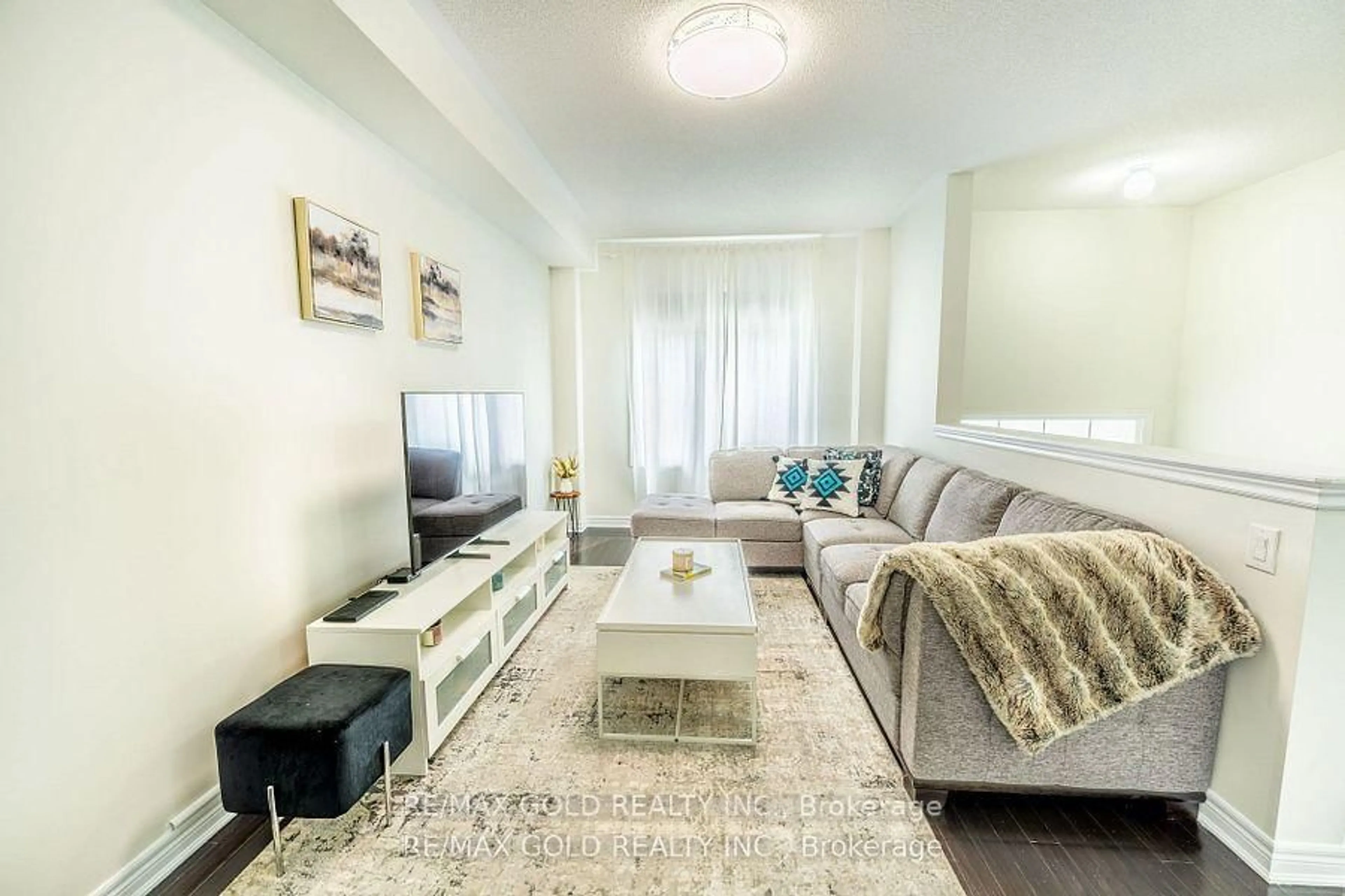 Living room with furniture, unknown for 34 Rockbrook Tr, Brampton Ontario L7A 4H8