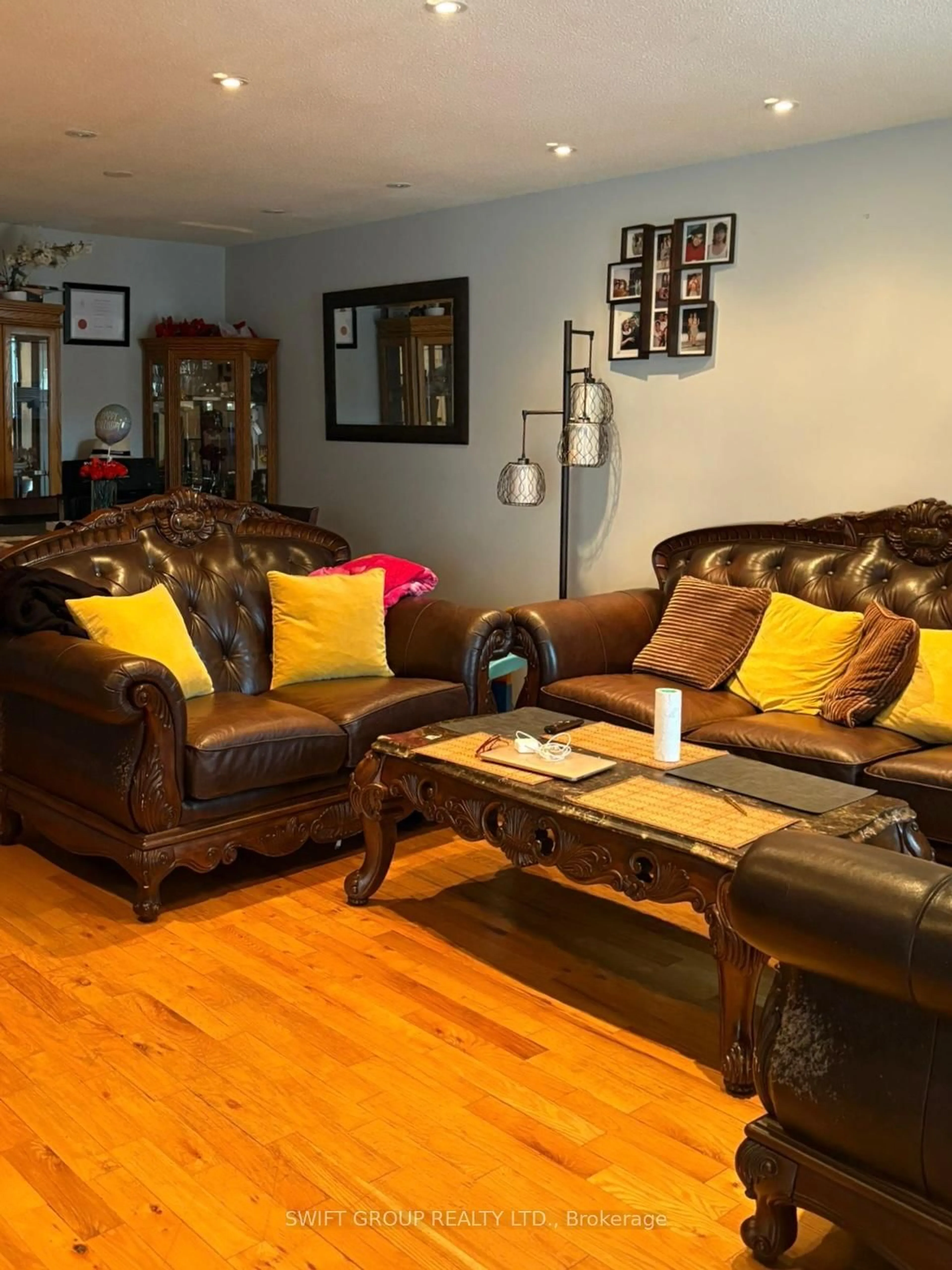 Living room with furniture, wood/laminate floor for 130 Chalfield Lane, Mississauga Ontario L4Z 1L2