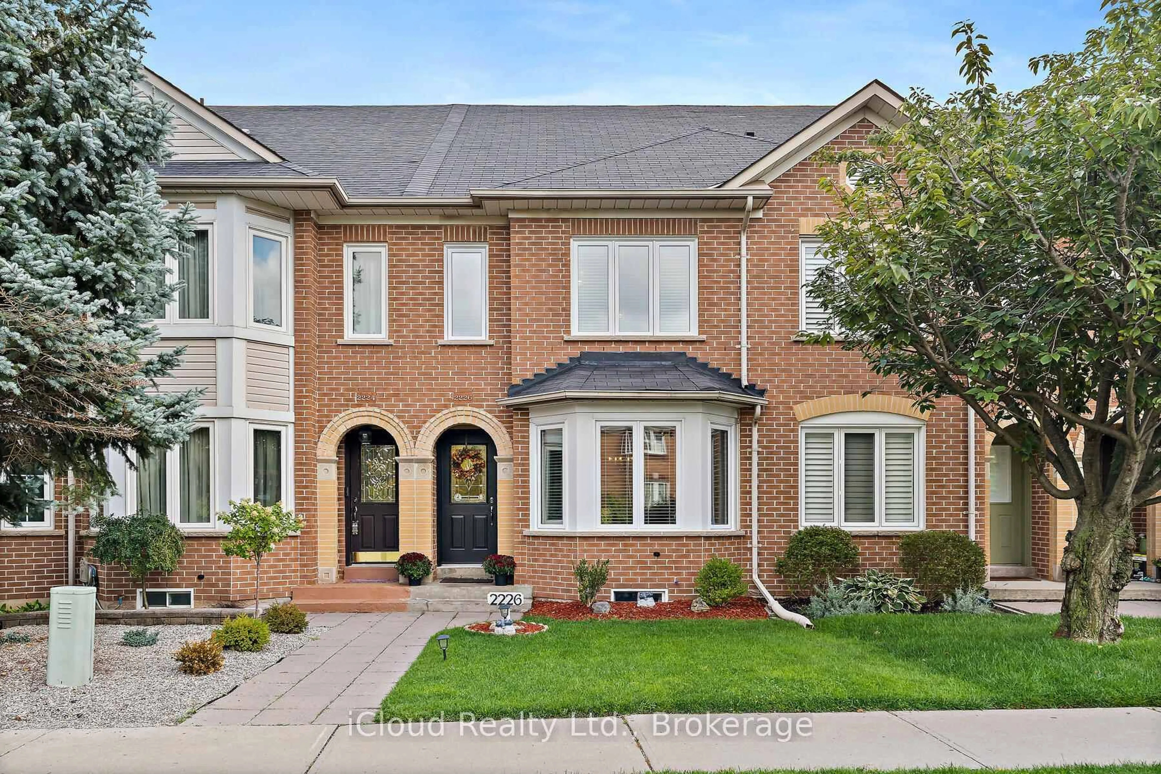 Home with brick exterior material, street for 2226 Westoak Trails Blvd, Oakville Ontario L6M 3N4