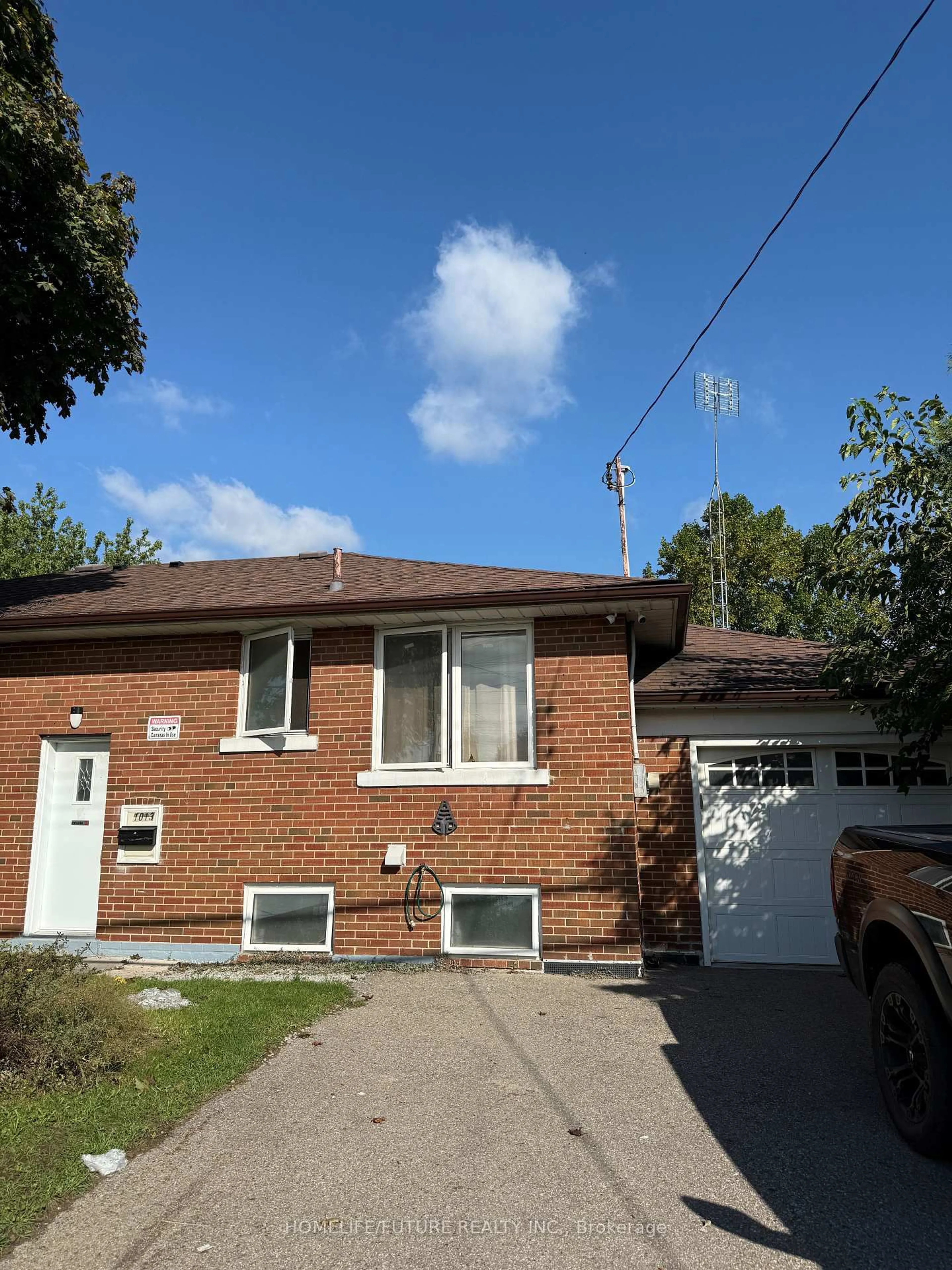 Home with brick exterior material, street for 1013 Islington Ave, Toronto Ontario M8Z 4R3