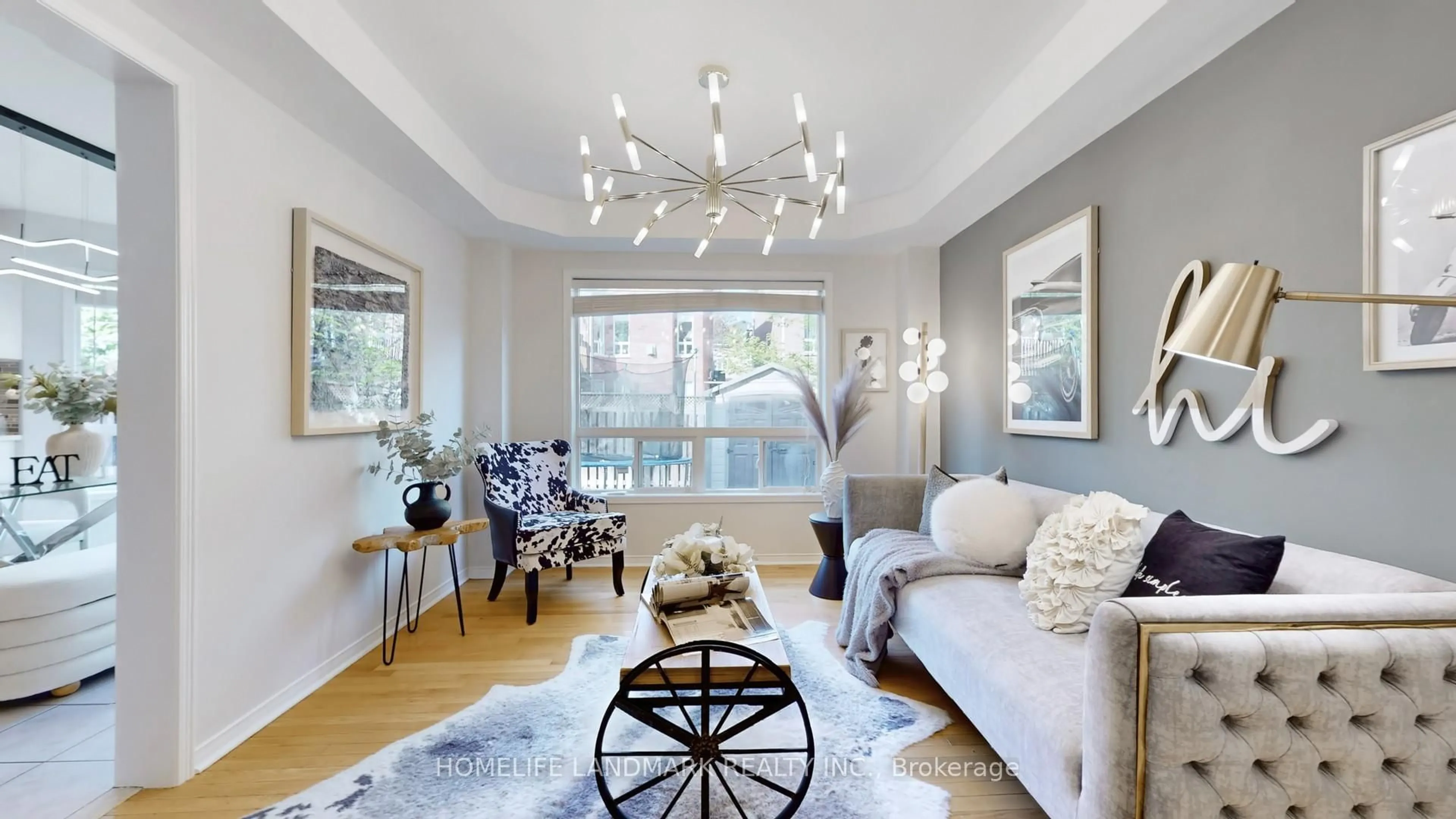 Living room with furniture, wood/laminate floor for 2151 Orchard Rd, Burlington Ontario L7L 7K6