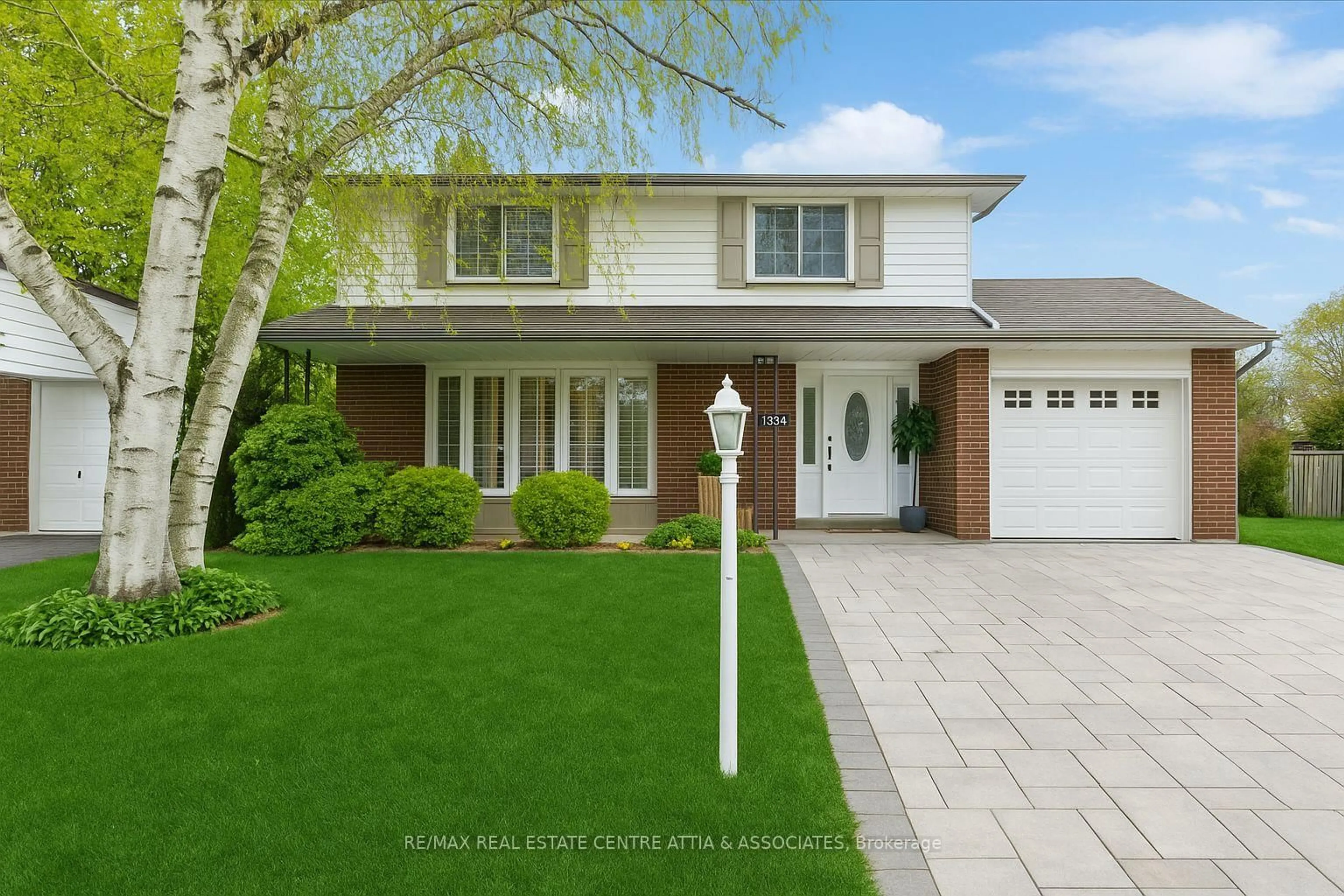 Home with vinyl exterior material, street for 1334 Strathy Ave, Mississauga Ontario L5E 2L2