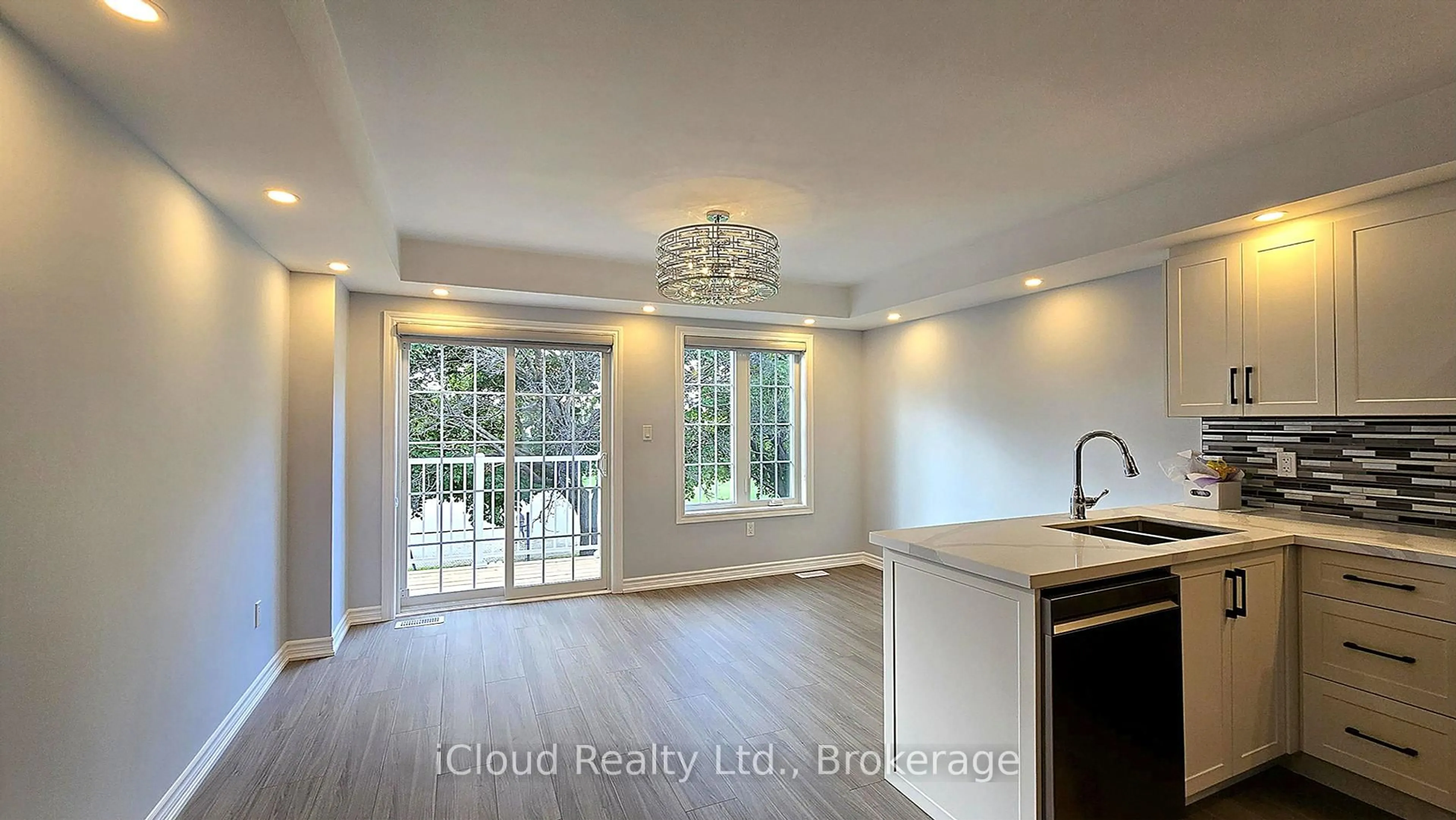 Open concept kitchen, wood/laminate floor for 43 Mantello Dr, Toronto Ontario M3J 0H6
