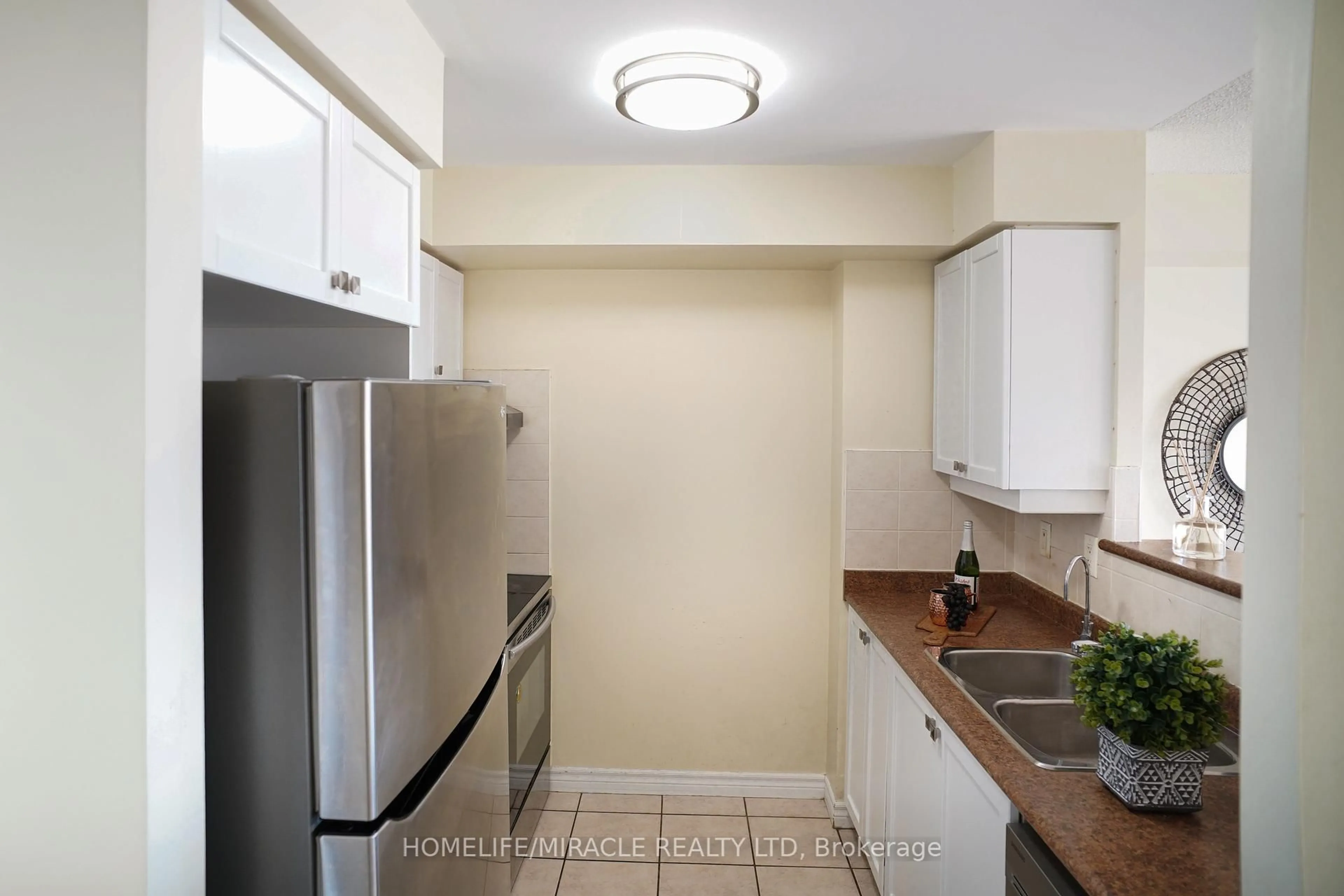 Standard kitchen, unknown for 700 Humberwood Blvd #2220, Toronto Ontario M9W 7J4