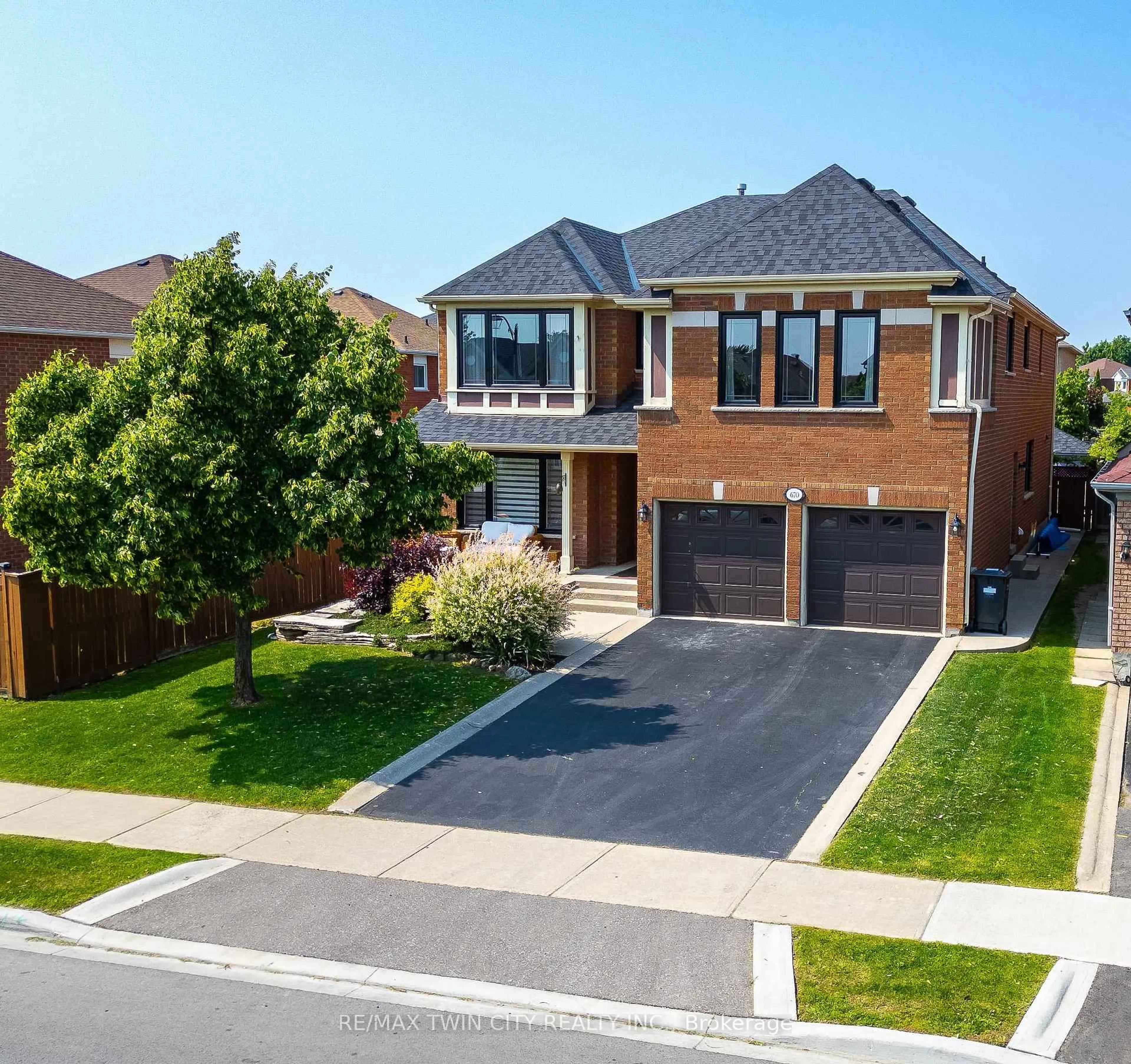 Home with brick exterior material, street for 670 Peter Robertson Blvd, Brampton Ontario L6R 1L8