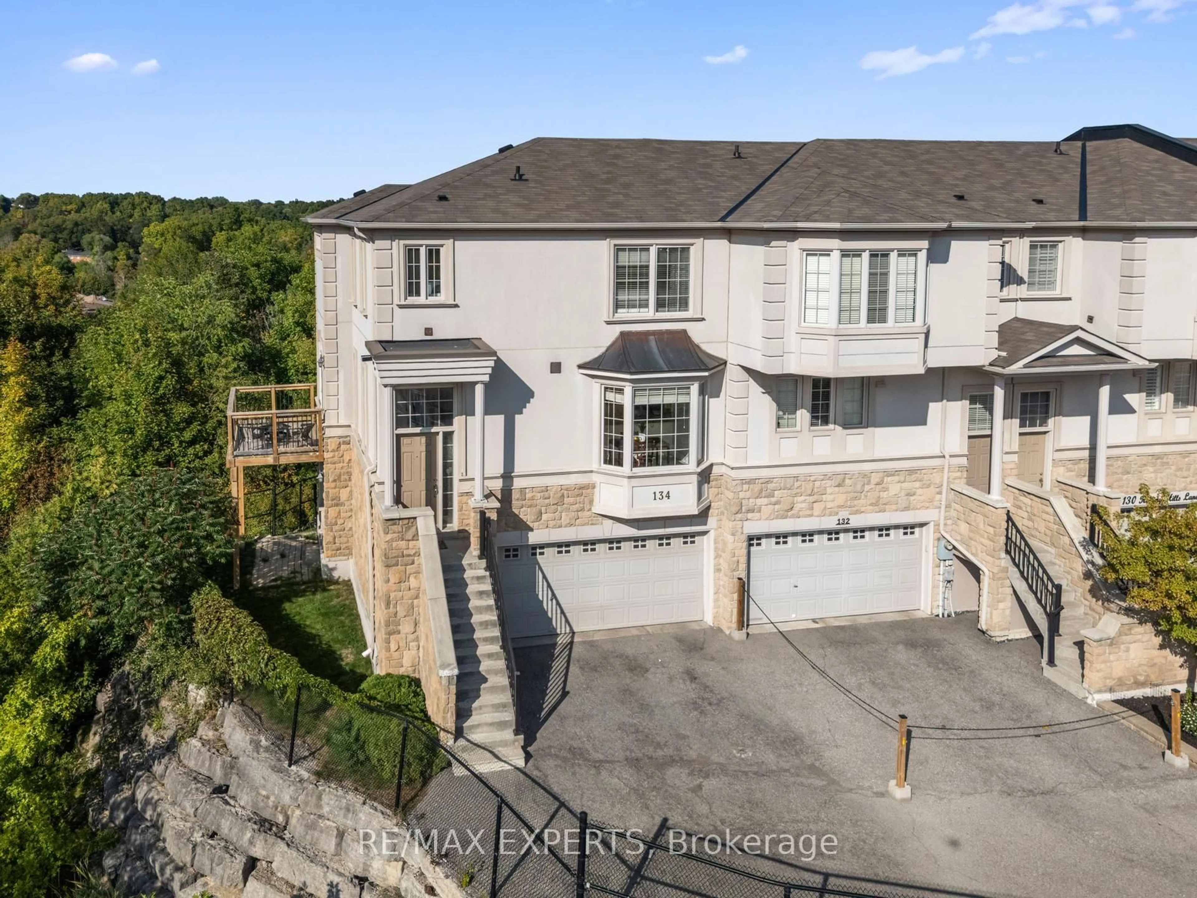 A pic from outside/outdoor area/front of a property/back of a property/a pic from drone, mountain view for 134 Rolling Hills Lane, Caledon Ontario L7E 4E1