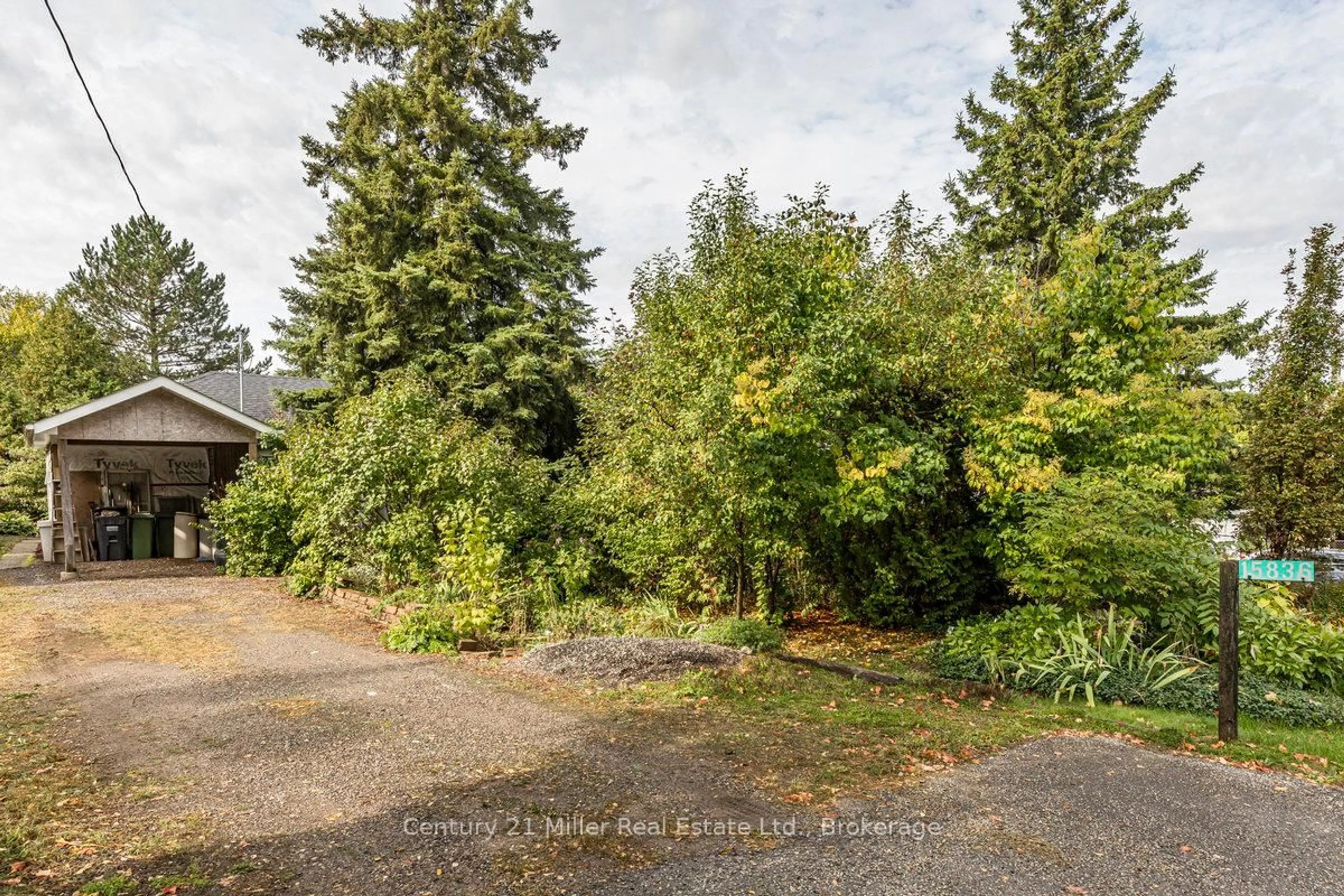 A pic from outside/outdoor area/front of a property/back of a property/a pic from drone, forest/trees view for 15836 Airport Rd, Caledon Ontario L7C 1K7