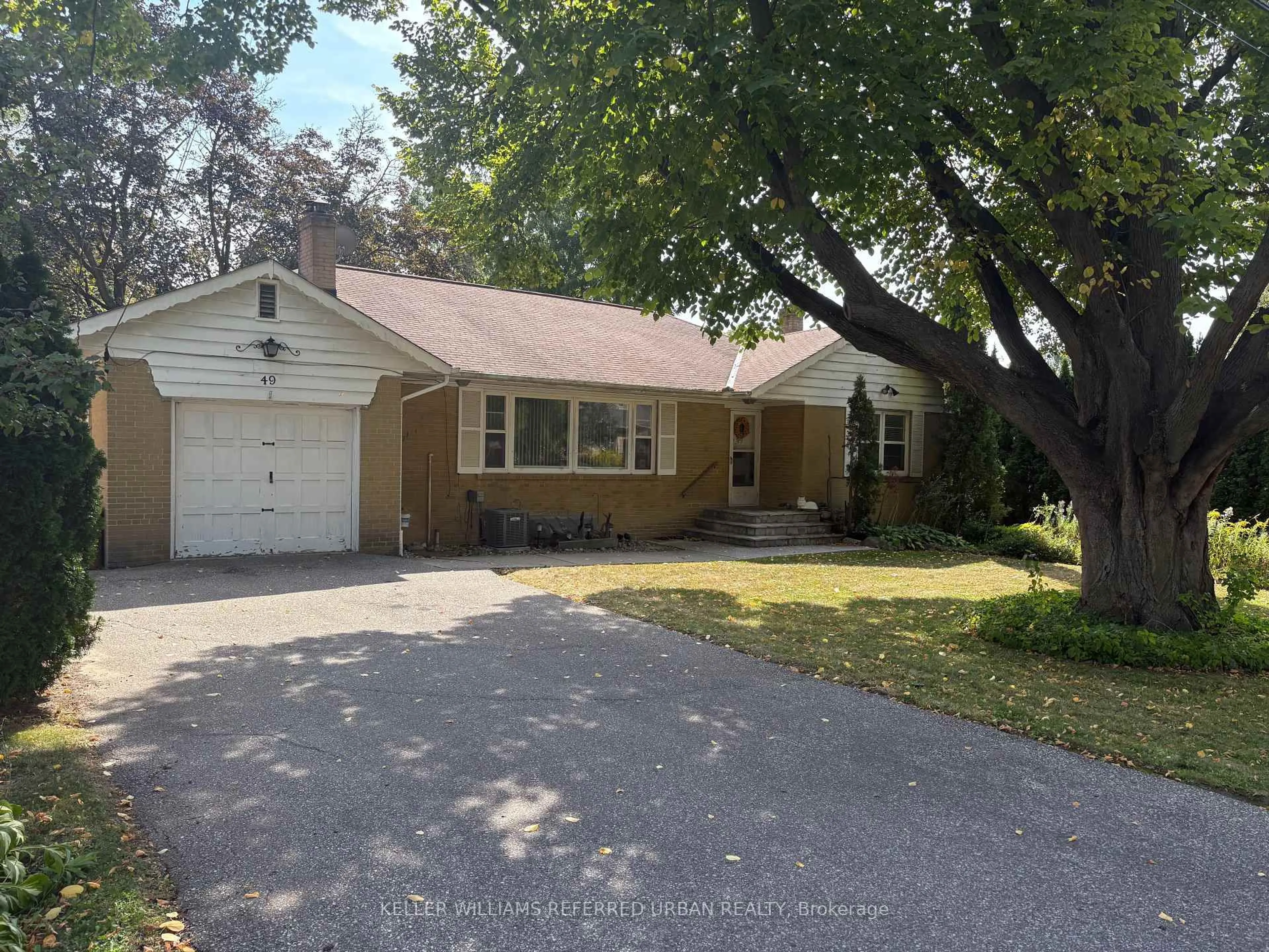 Home with vinyl exterior material, street for 49 Rockingham Dr, Toronto Ontario M9A 1P5