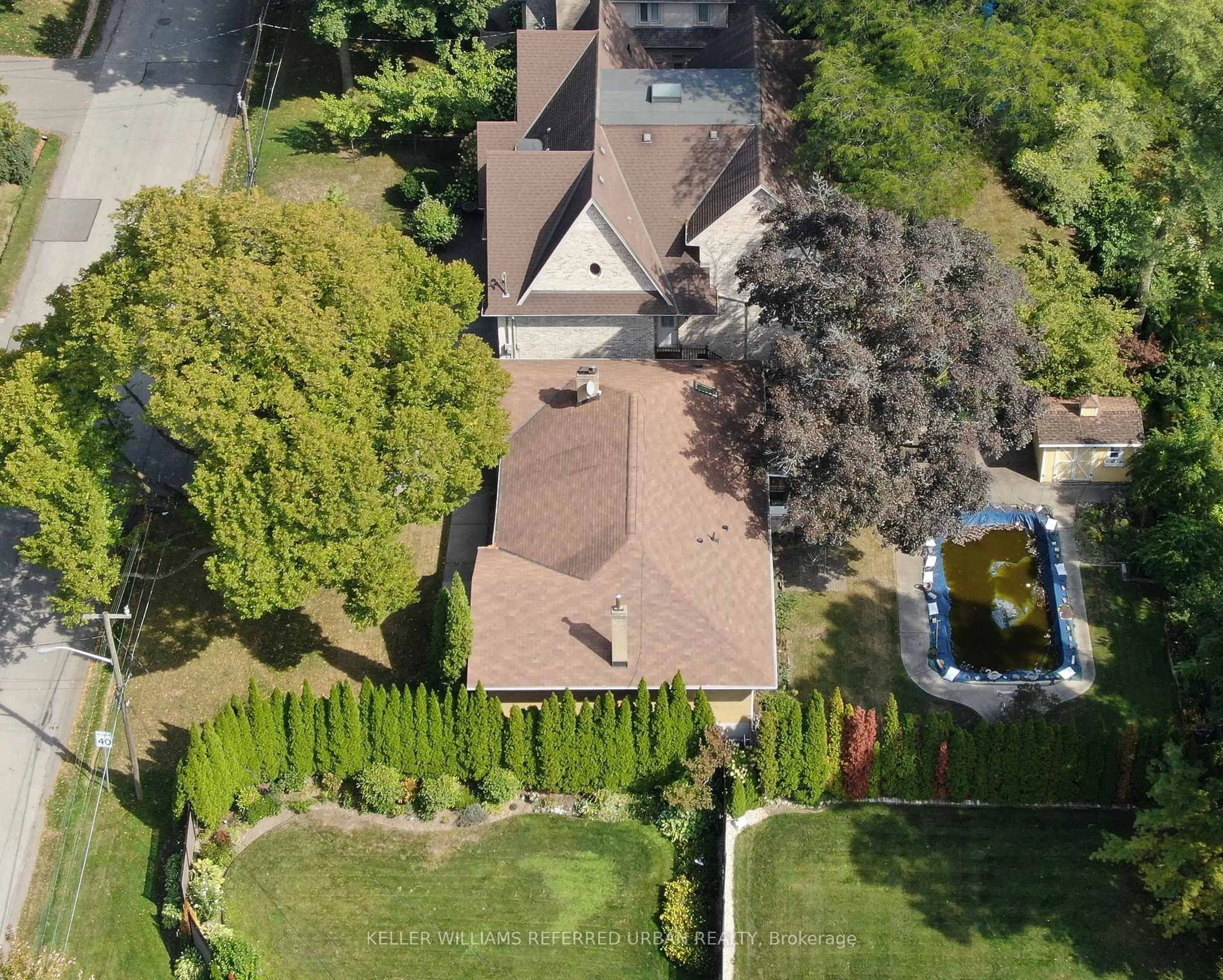 A pic from outside/outdoor area/front of a property/back of a property/a pic from drone, street for 49 Rockingham Dr, Toronto Ontario M9A 1P5
