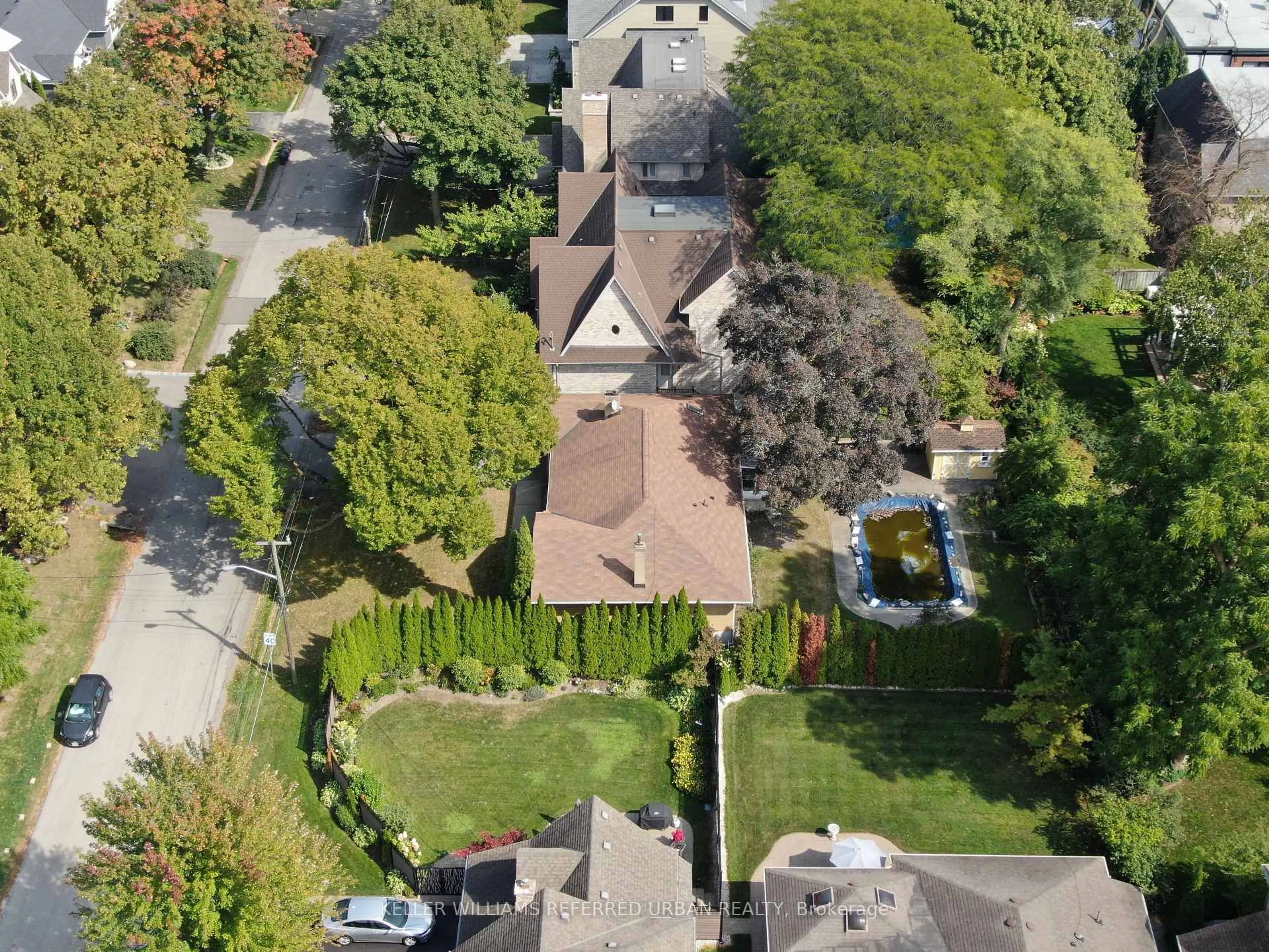 A pic from outside/outdoor area/front of a property/back of a property/a pic from drone, street for 49 Rockingham Dr, Toronto Ontario M9A 1P5