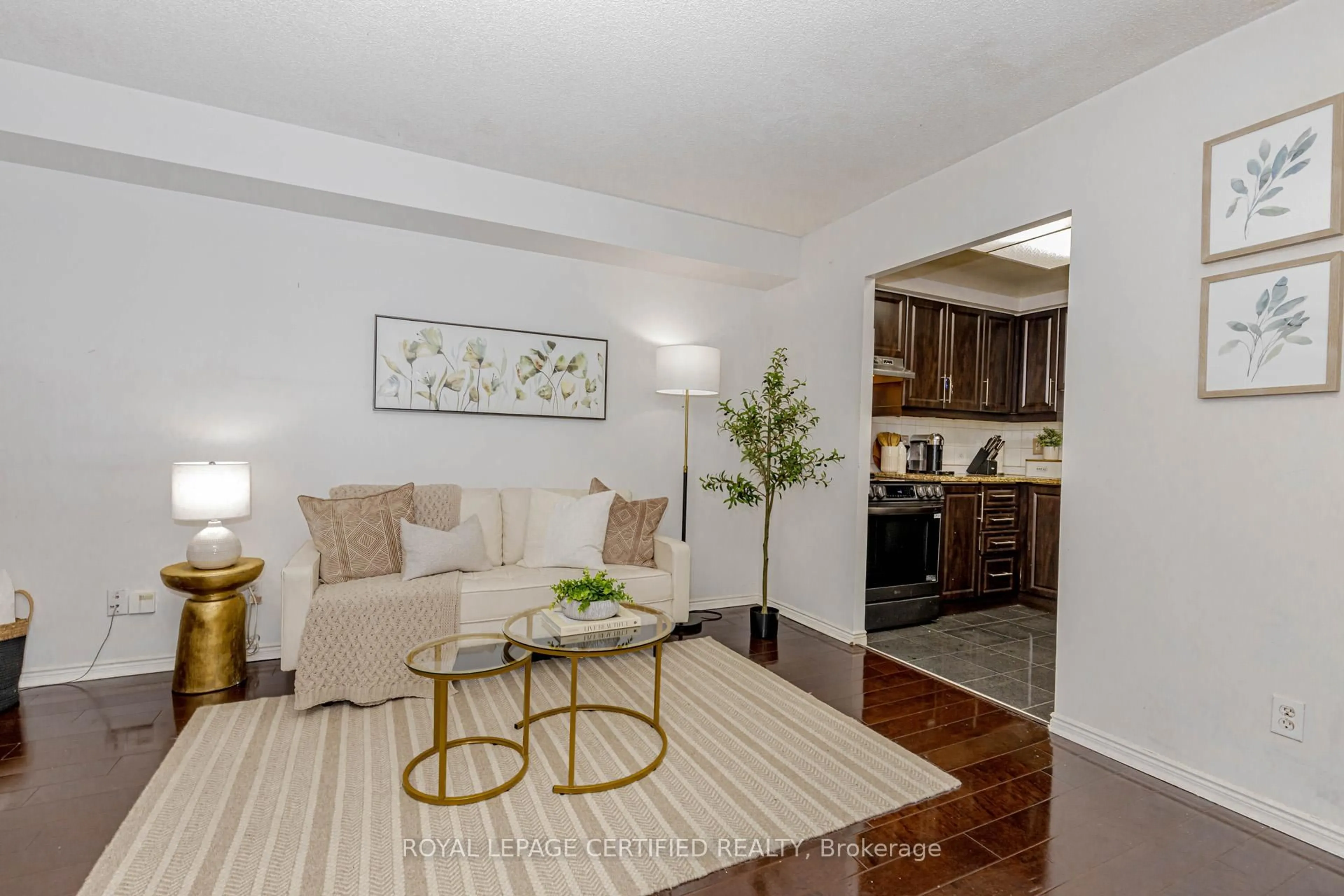 Living room with furniture, unknown for 135 Hillcrest Ave #313, Mississauga Ontario L5B 4B1