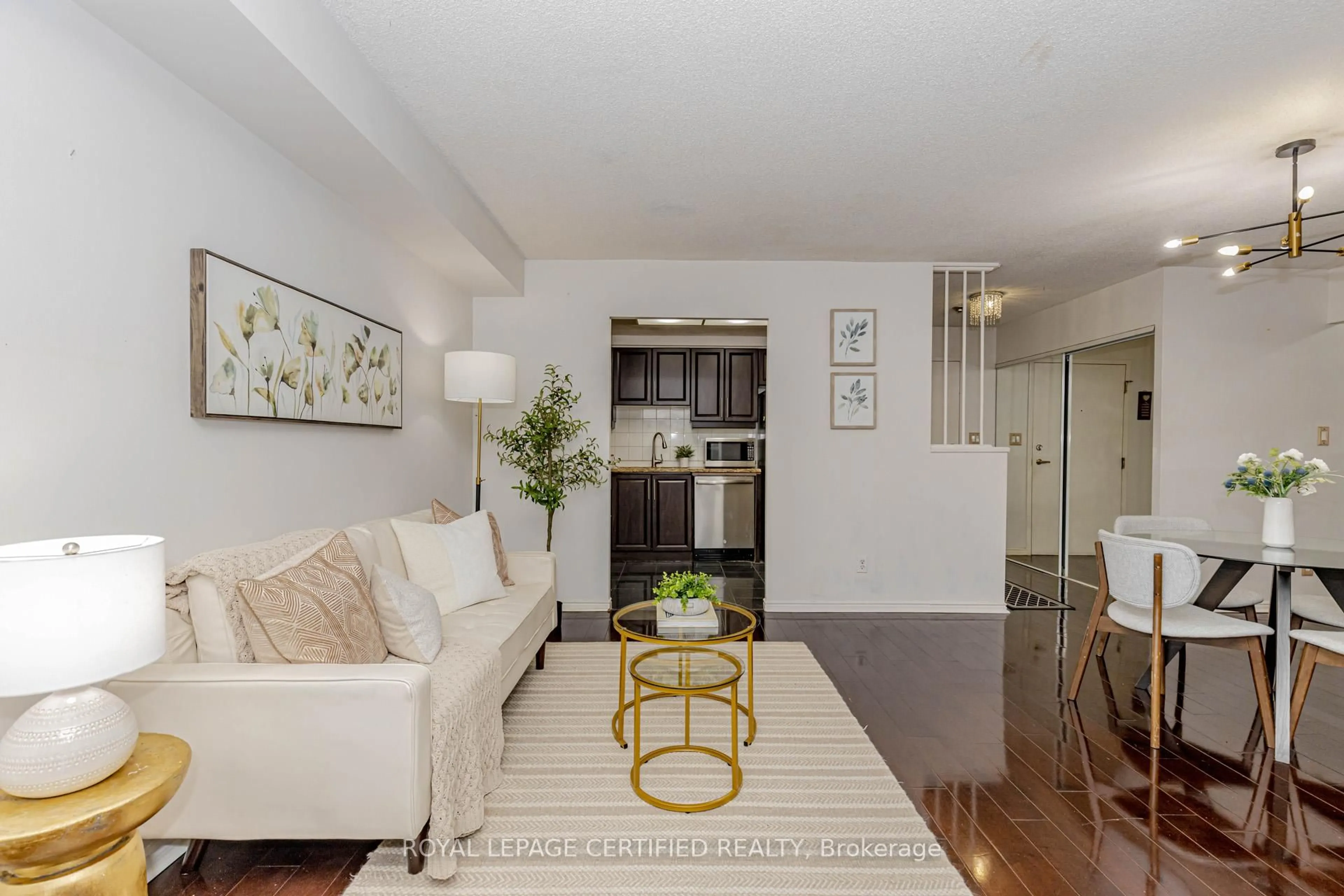 Living room with furniture, unknown for 135 Hillcrest Ave #313, Mississauga Ontario L5B 4B1