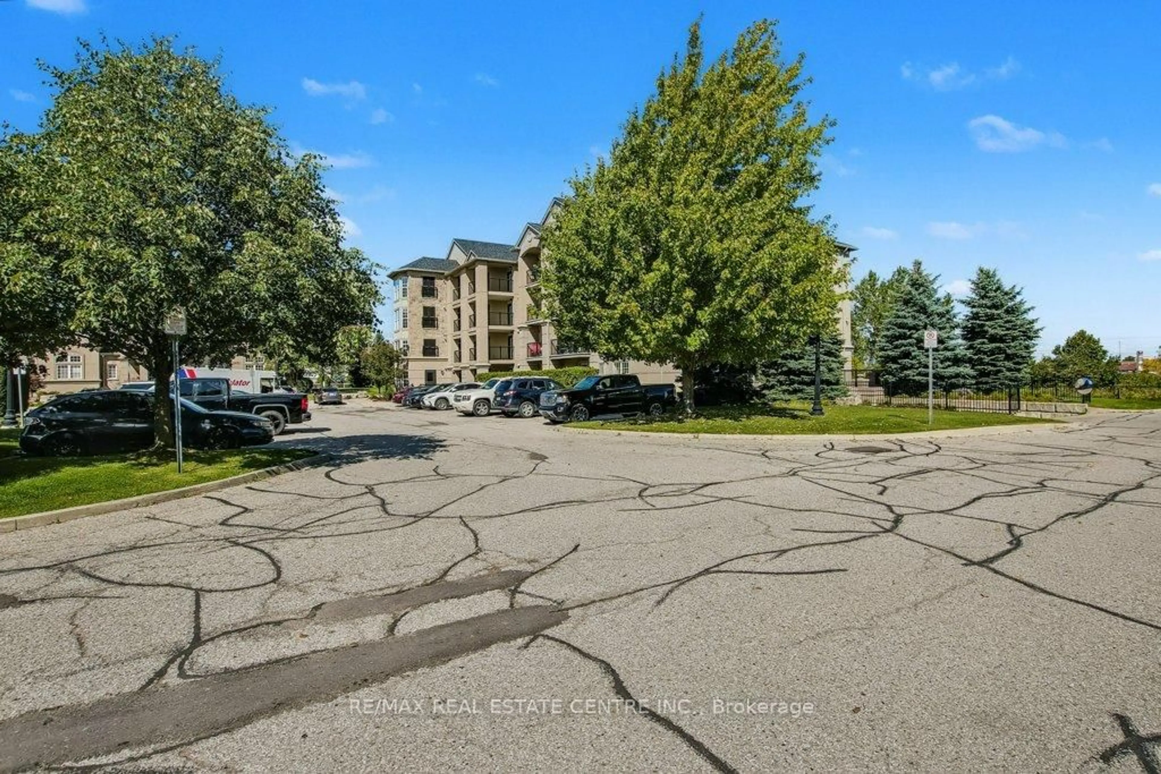 A pic from outside/outdoor area/front of a property/back of a property/a pic from drone, unknown for 1479 Maple Ave #407, Milton Ontario L9T 0B5