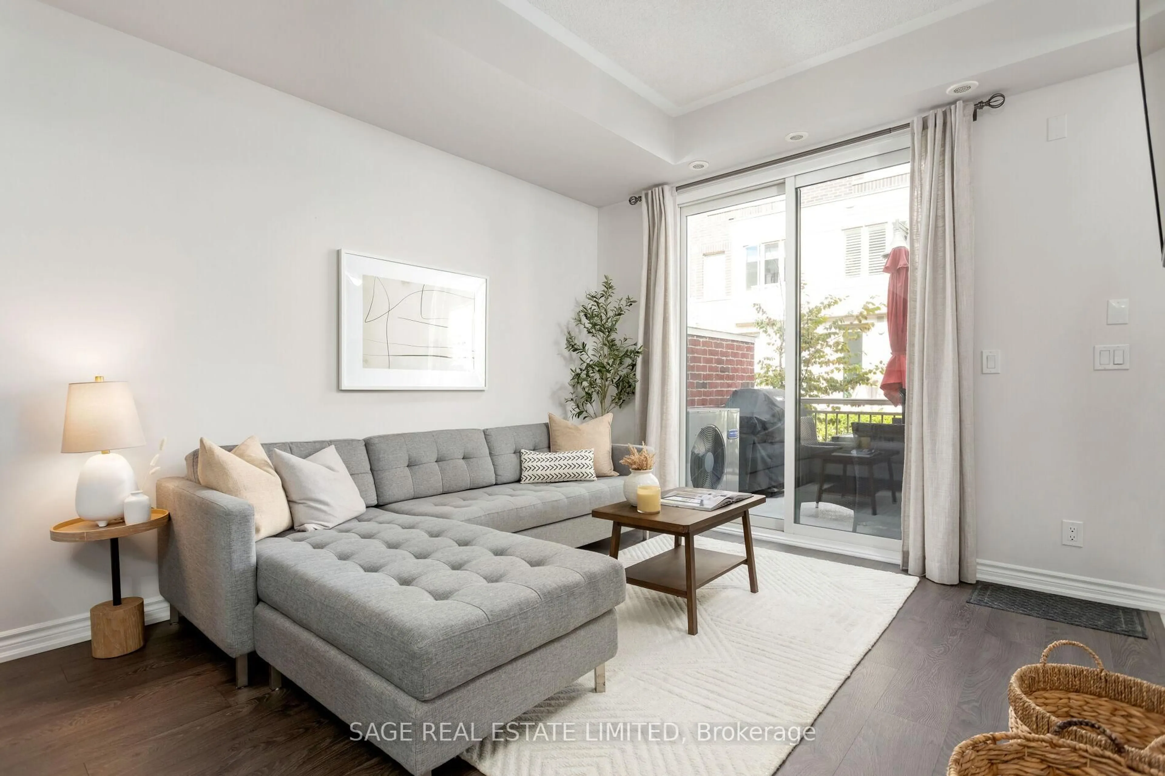Living room with furniture, unknown for 135 Long Branch Ave #6, Toronto Ontario M8W 0A9