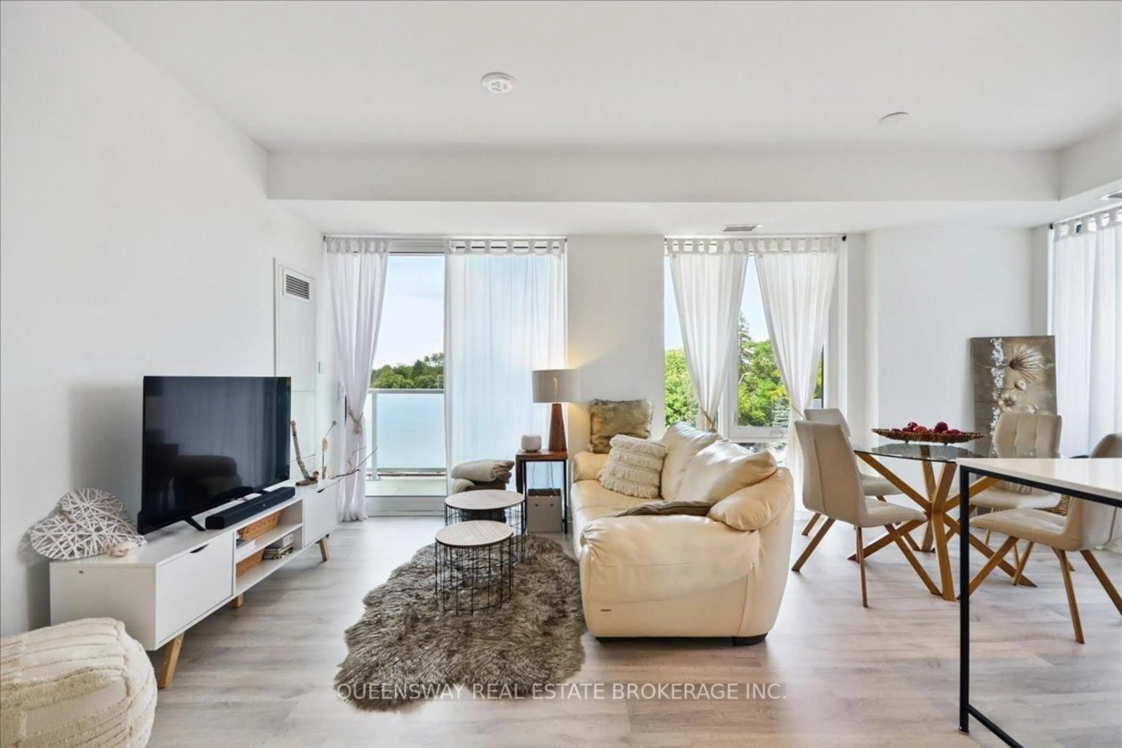 Living room with furniture, unknown for 215 Lakeshore Rd #443, Mississauga Ontario L5H 0A7