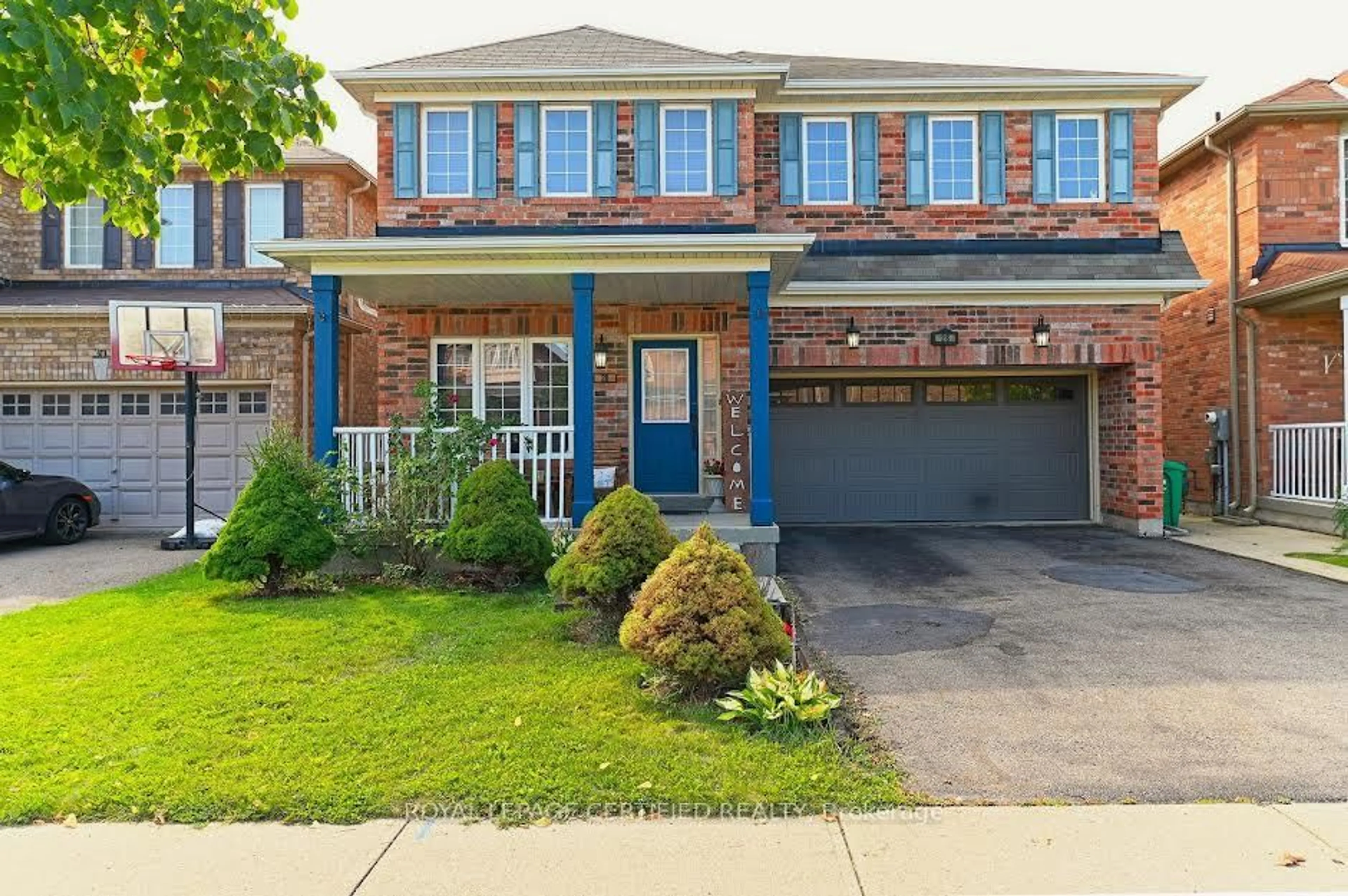 Home with brick exterior material, street for 28 Abbotsbury Dr, Brampton Ontario L6X 0S3