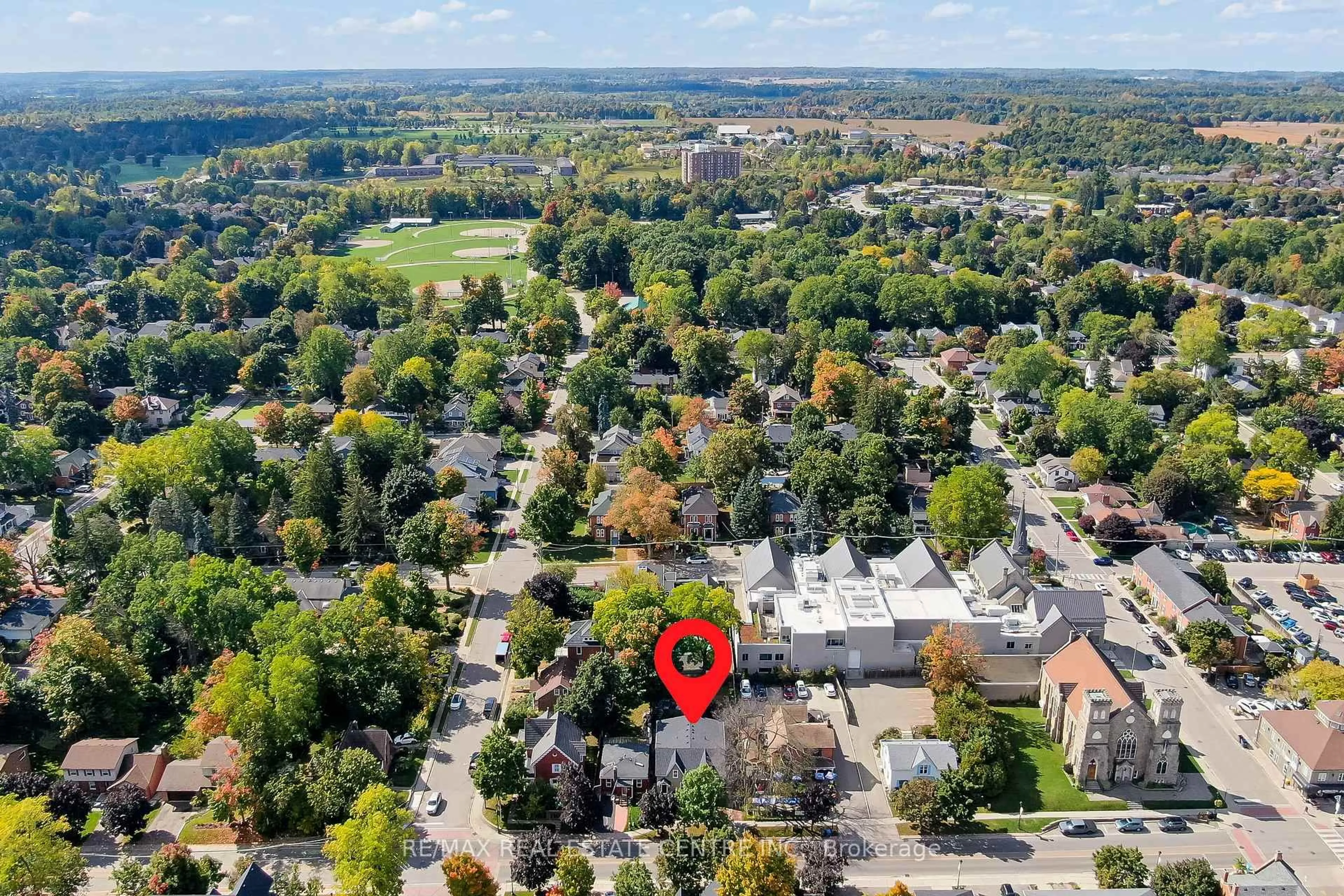 A pic from outside/outdoor area/front of a property/back of a property/a pic from drone, unknown for 128-130 Main St, Halton Hills Ontario L7G 3E6