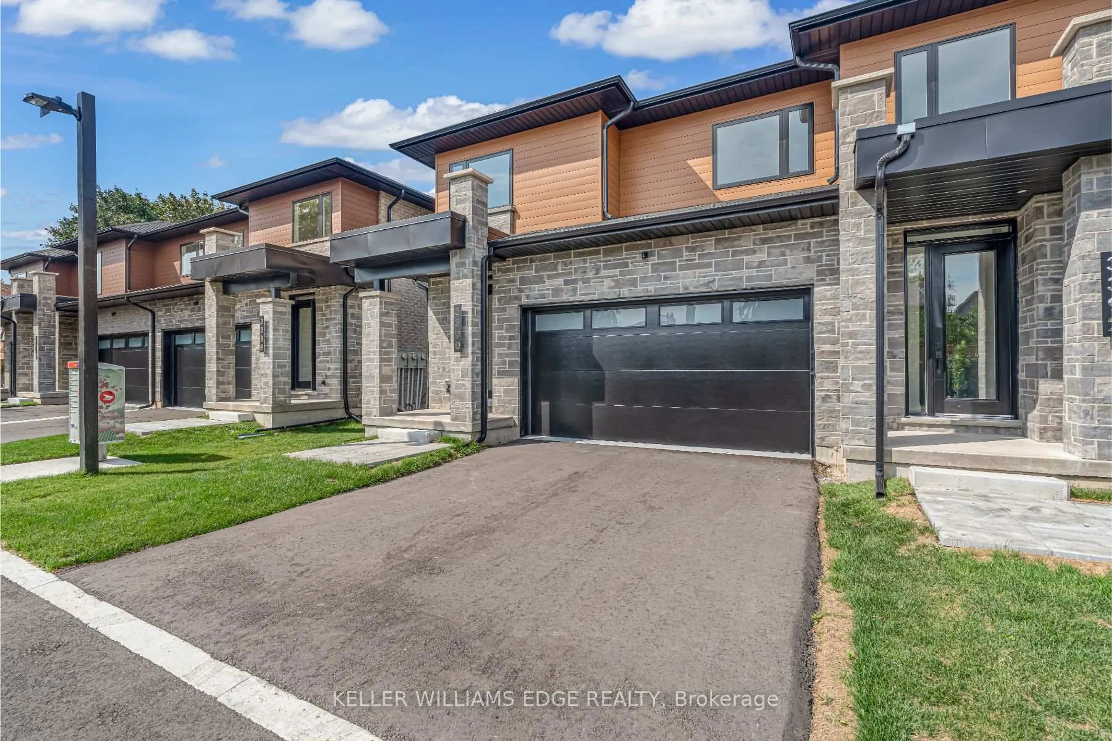 Home with brick exterior material, street for 2154 Walkers Line #6, Burlington Ontario L7M 3R9