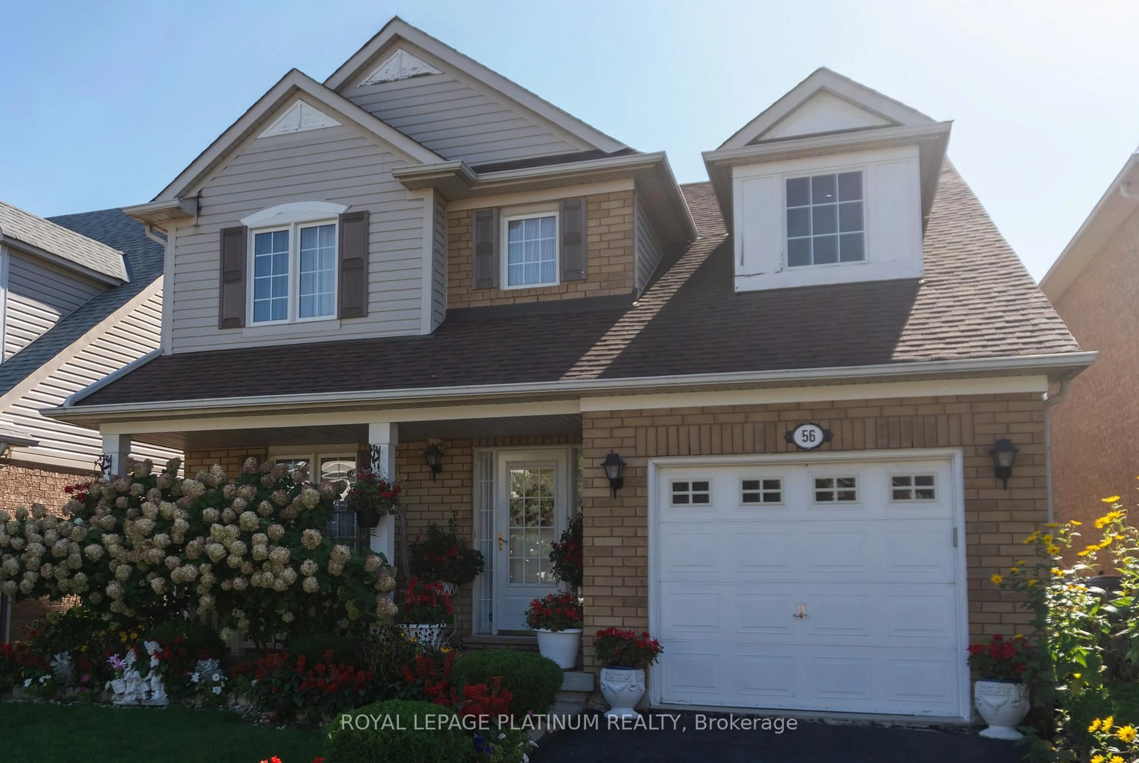 Home with vinyl exterior material, street for 56 Vista Green Cres, Brampton Ontario L7A 2S4