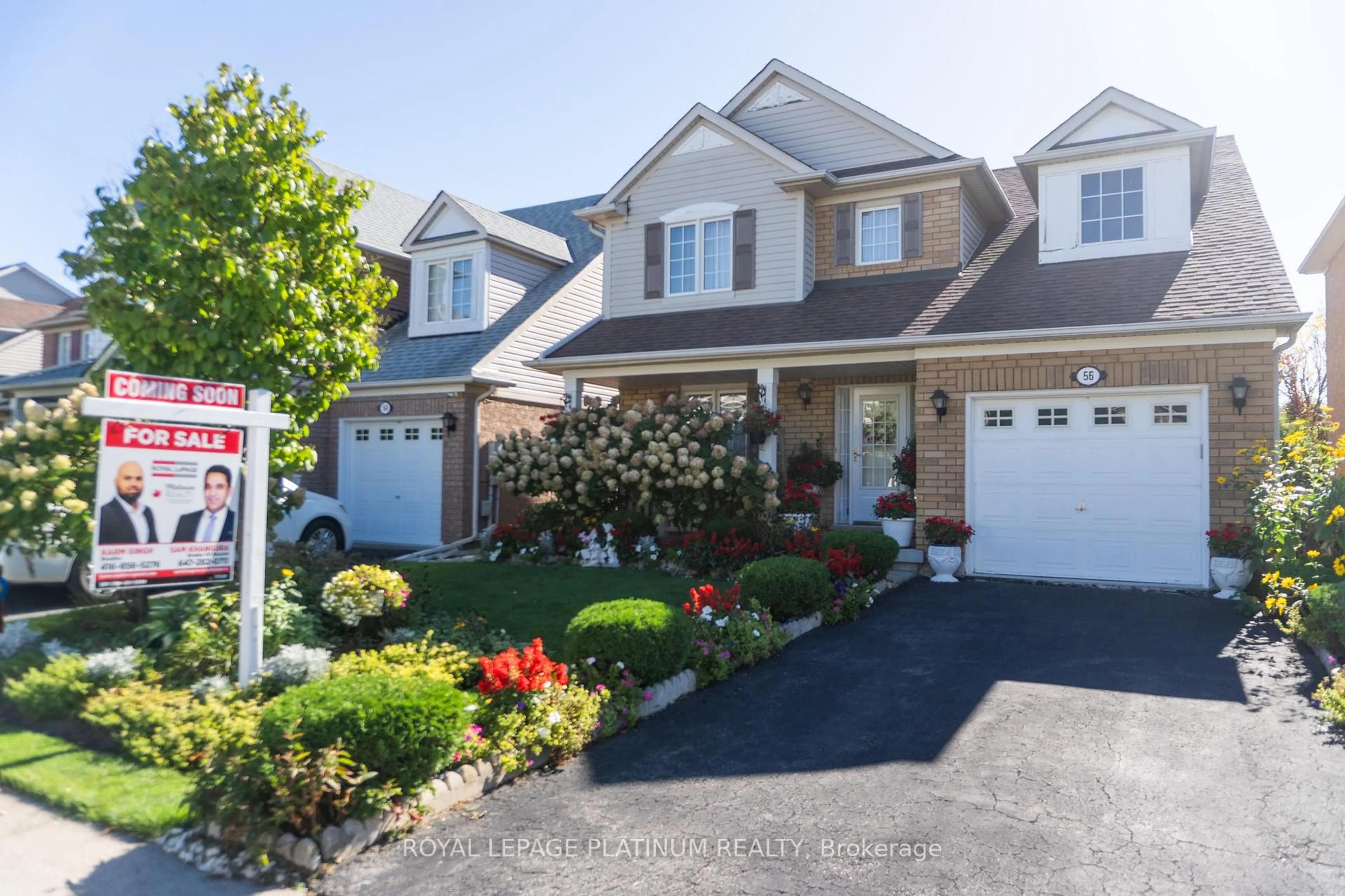 Home with vinyl exterior material, street for 56 Vista Green Cres, Brampton Ontario L7A 2S4