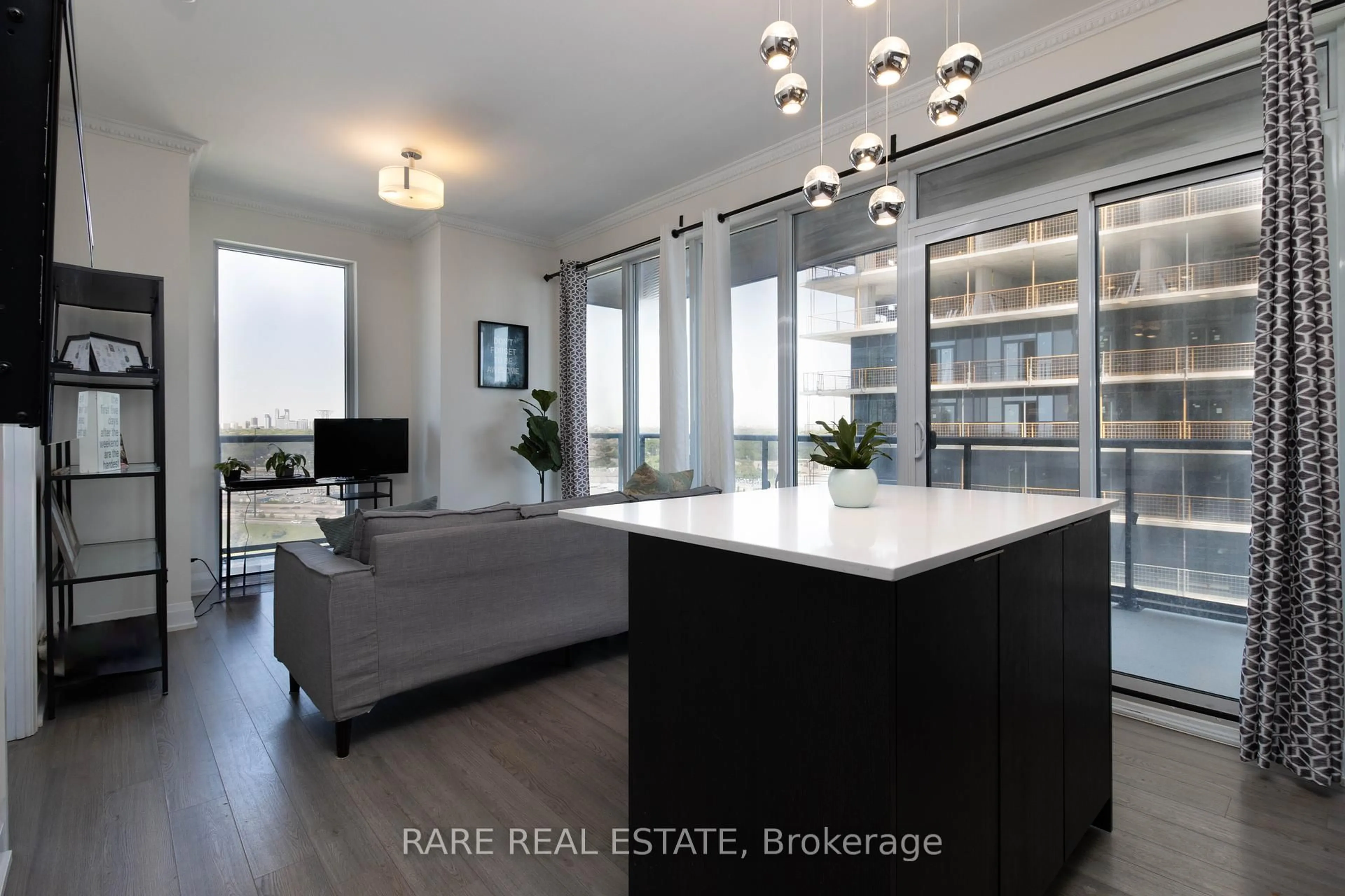 Open concept kitchen, wood/laminate floor for 56 Annie Craig Dr #1908, Toronto Ontario M8V 0C8