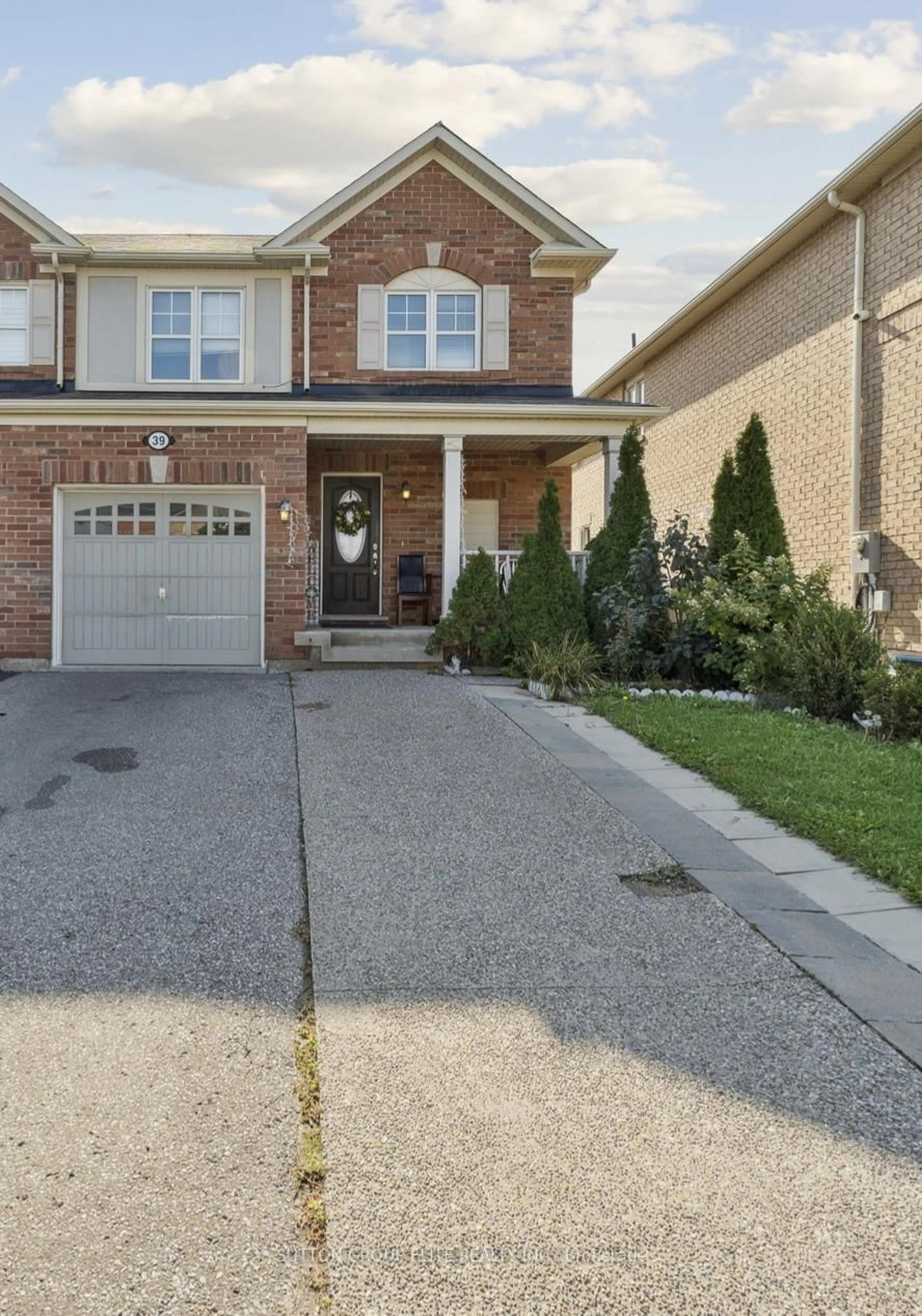 Home with brick exterior material, street for 39 caliper Rd, Brampton Ontario L6P 3R2