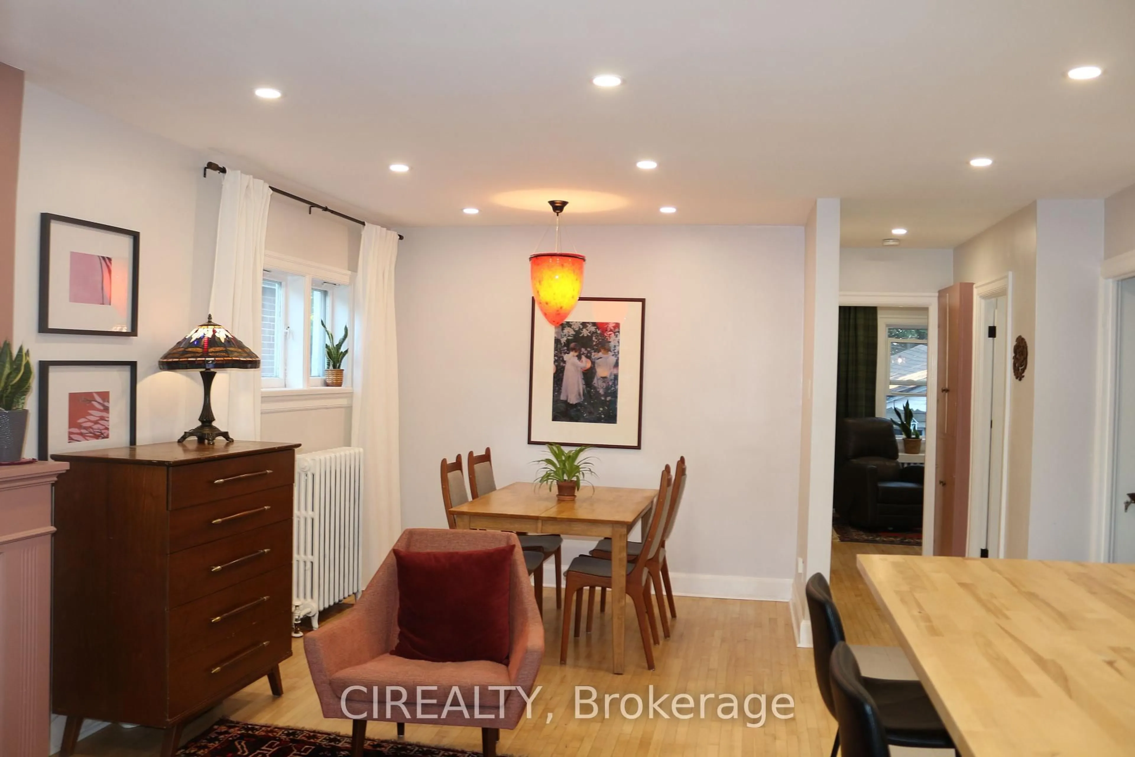 Dining room, wood/laminate floor for 140 Ellins Ave, Toronto Ontario M6N 2B1