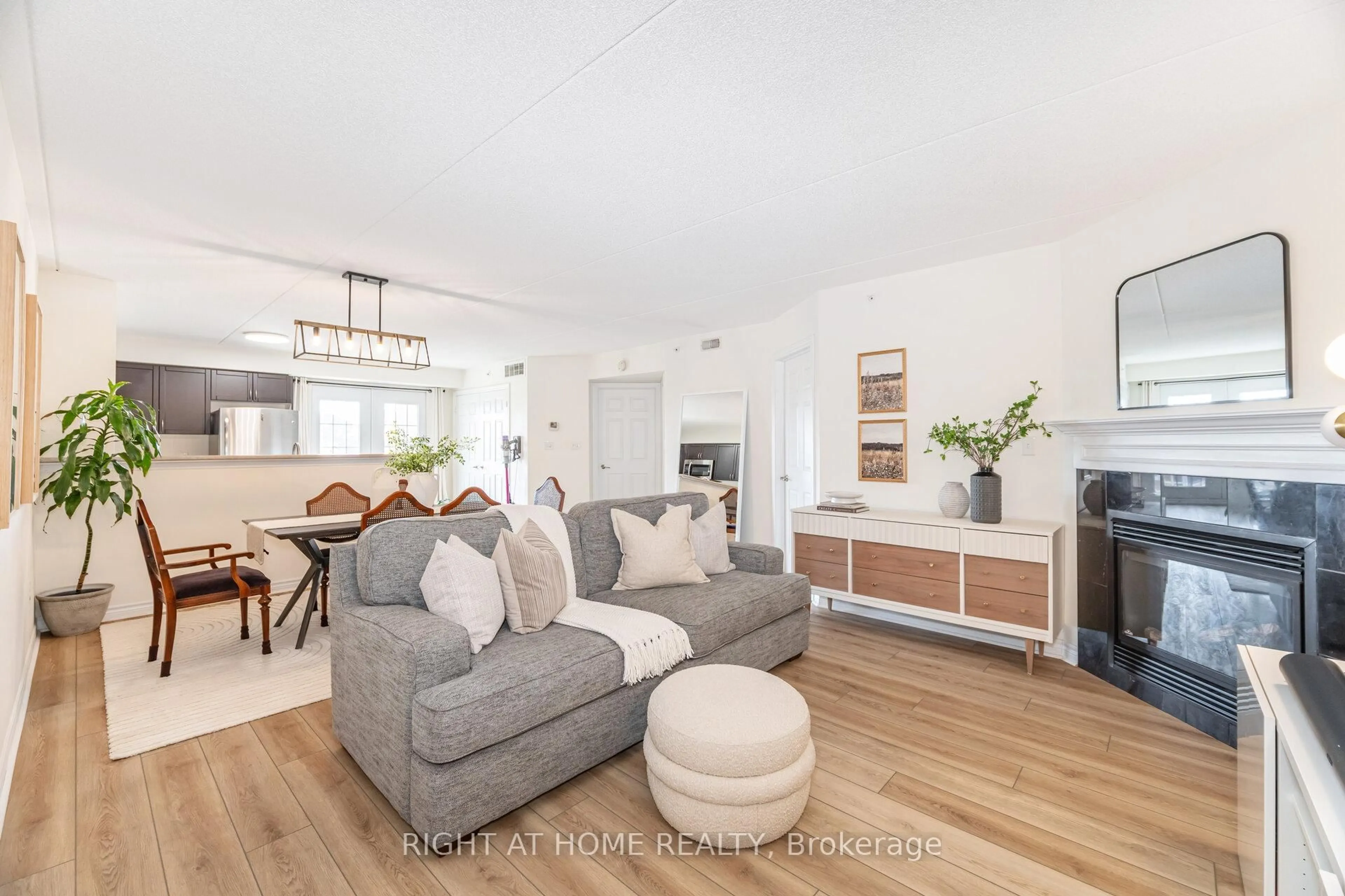 Living room with furniture, unknown for 1370 Main St #311, Milton Ontario L9T 7S8